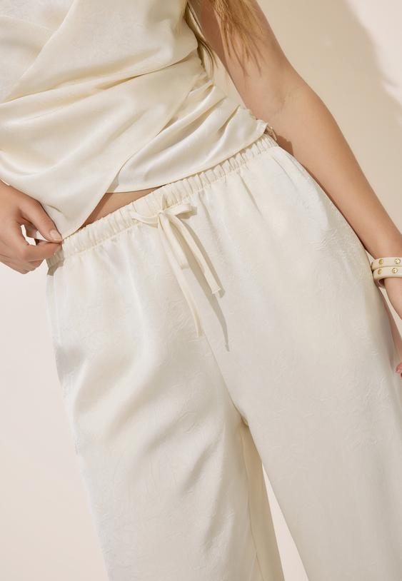 calcas de vestir com pincas