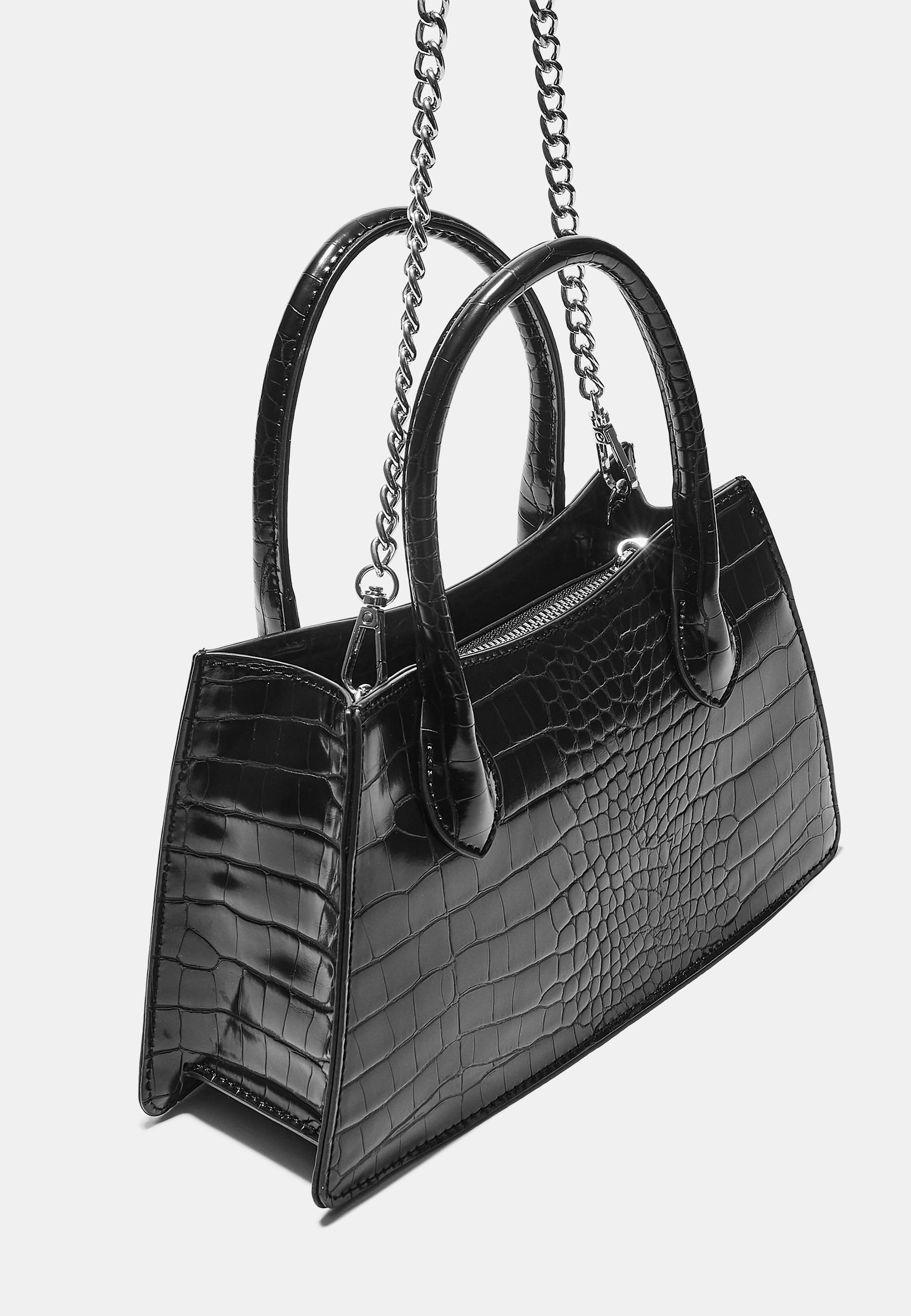 Trapeze shoulder bag with coconut effect — Black