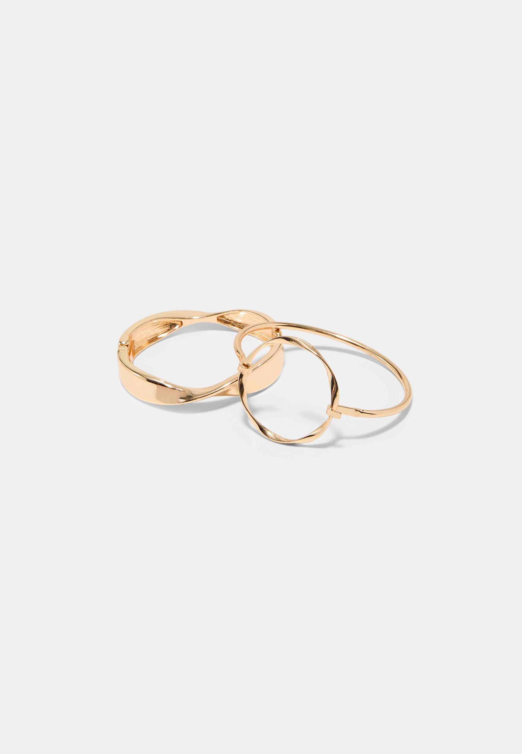 Set of 2 wavy rigid bangles — Gold