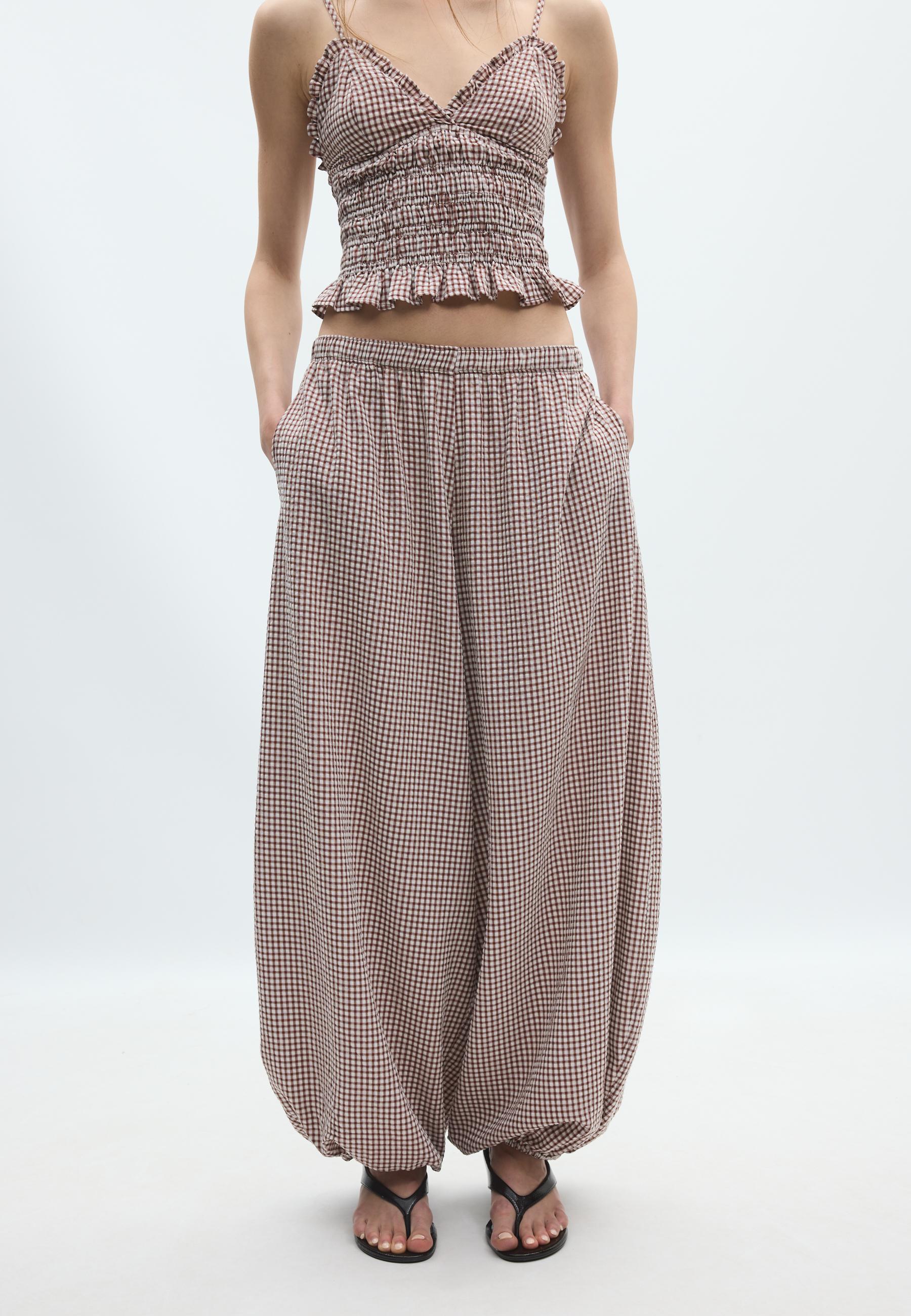 Checked print voluminous trousers — Terracotta