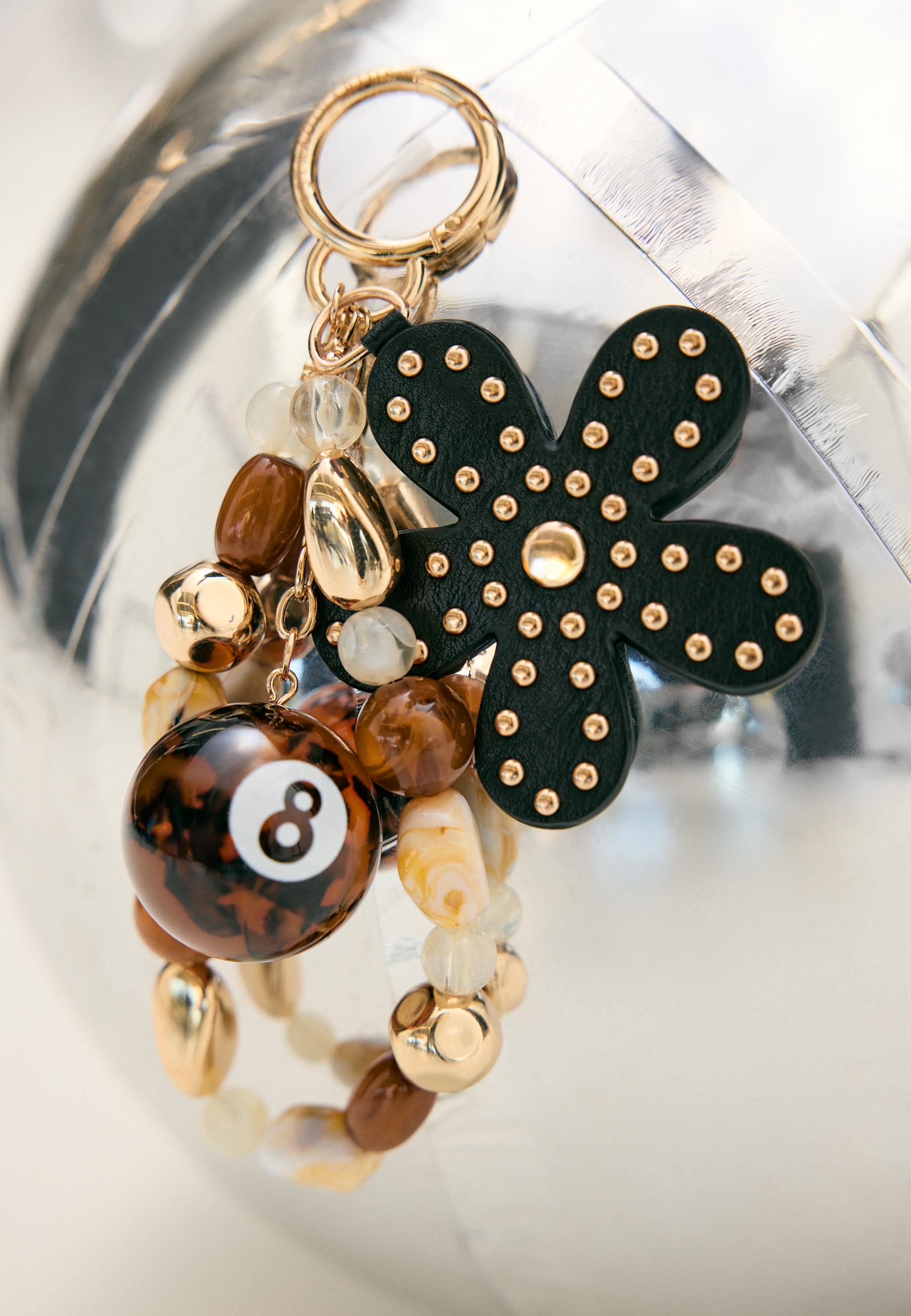 Flower and 8 ball charm — Brown