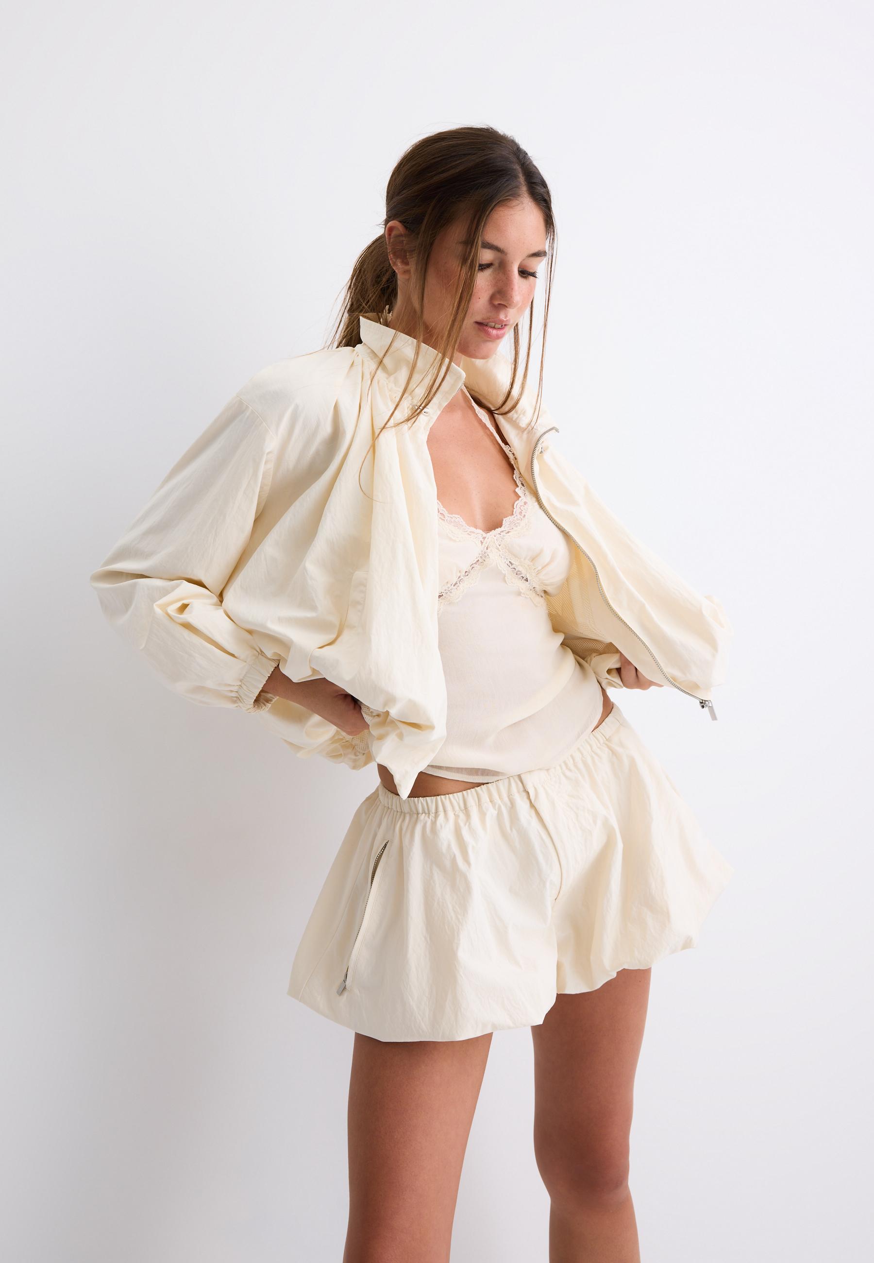 Technical high neck jacket — Ecru
