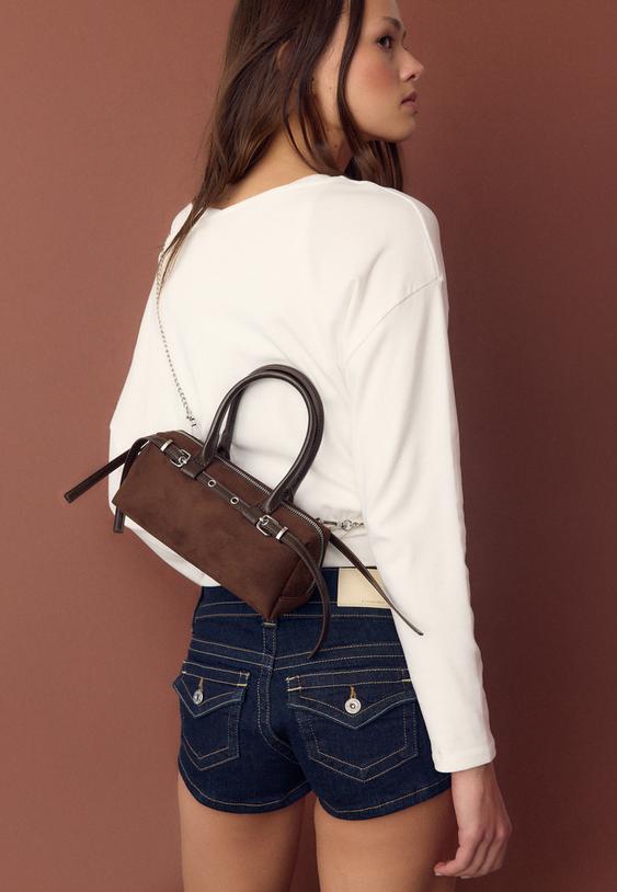 langliche-tasche-mit-gurtelriemen