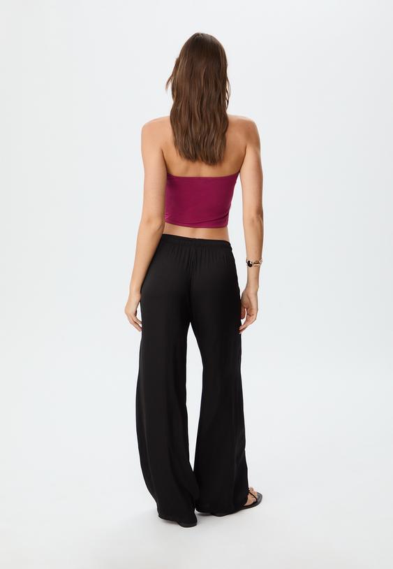 lange soepelvallende broek van zijdeachtige stof