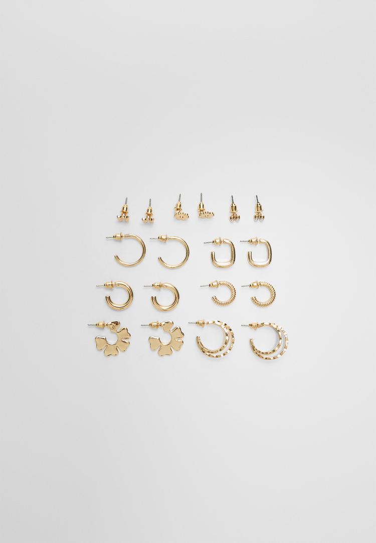 set 9 pendientes flor