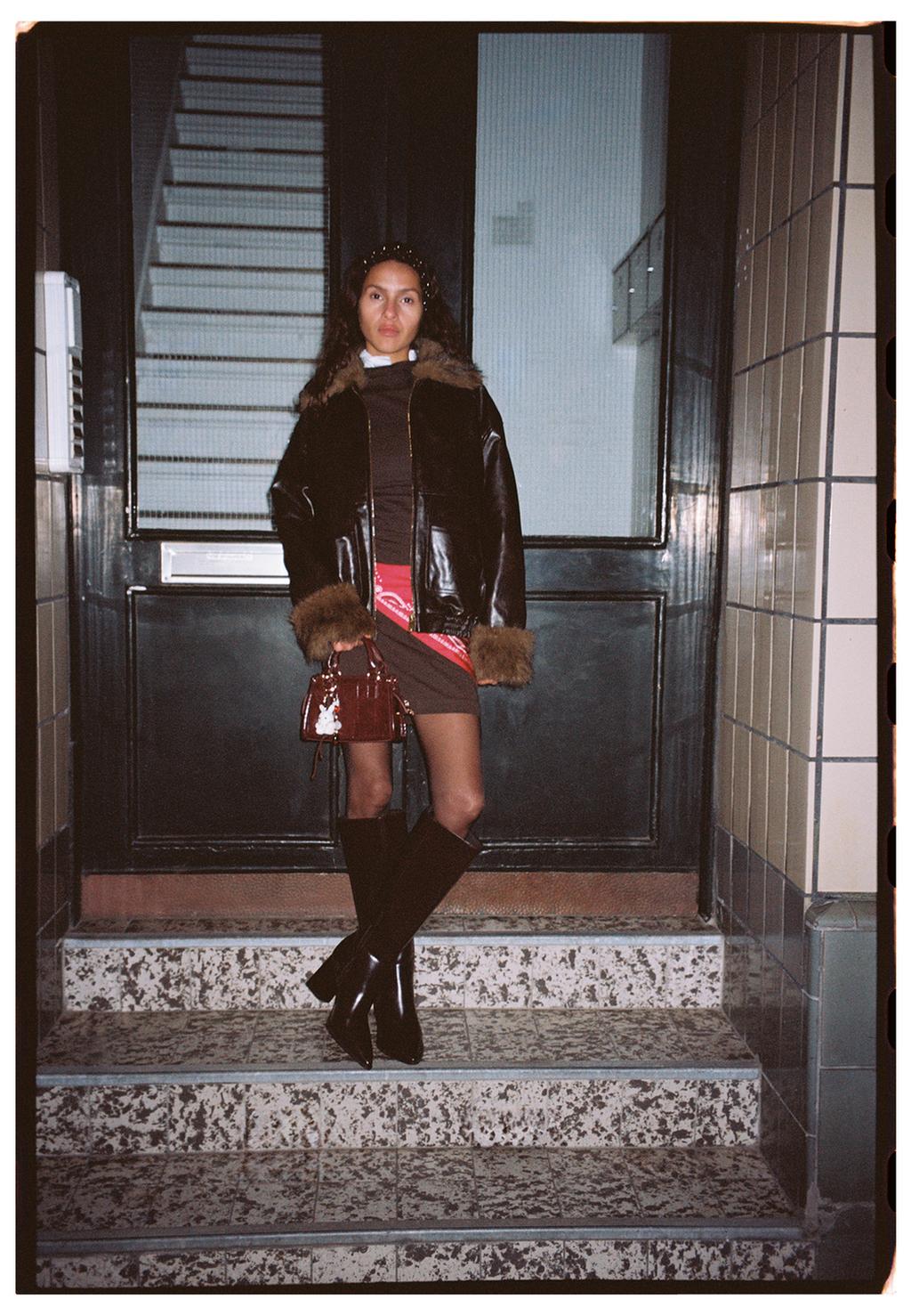 Leather effect padded jacket with faux fur details