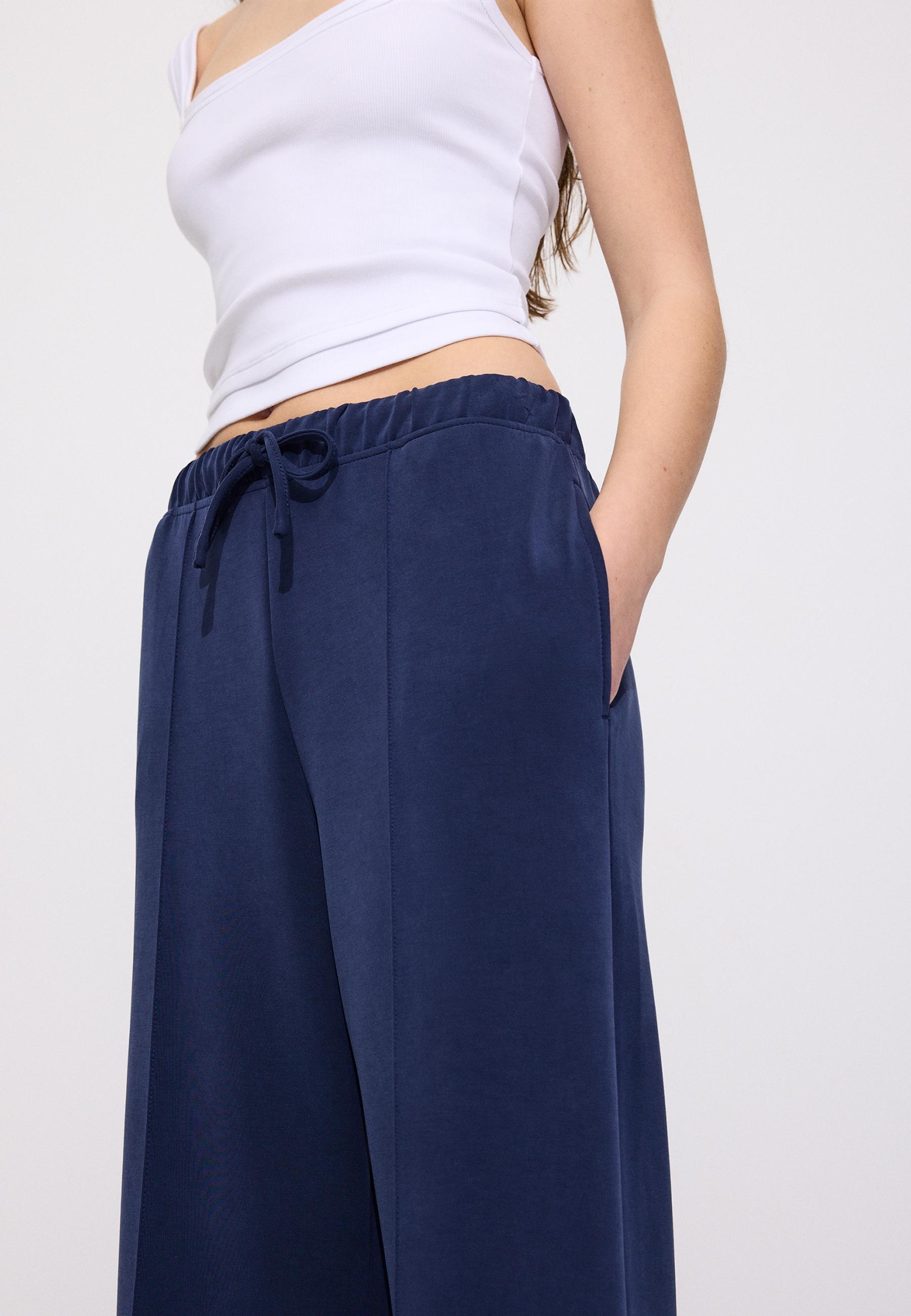 Soft-touch wide-leg pin-tuck joggers — Navy blue