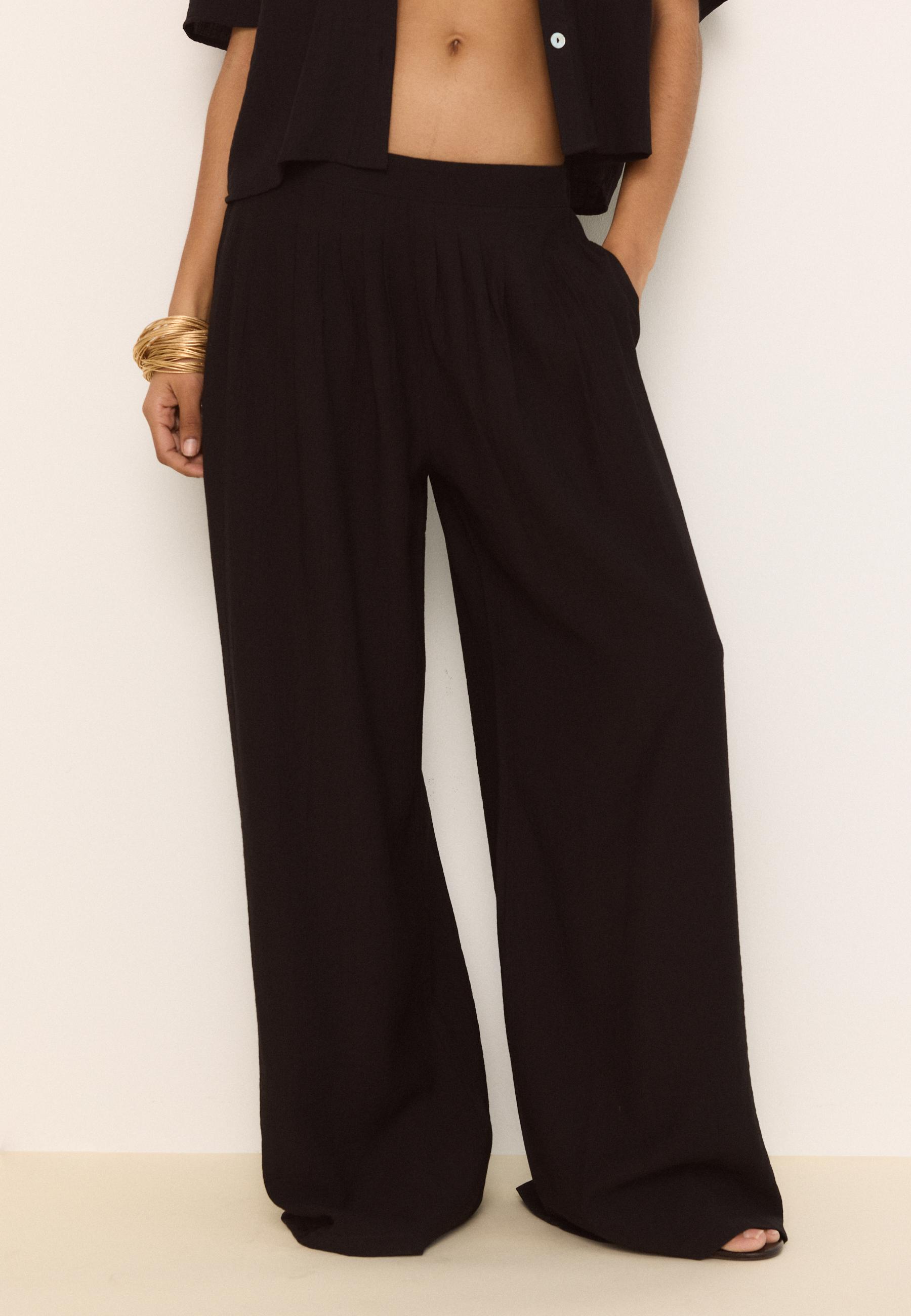 Darted palazzo trousers — Black