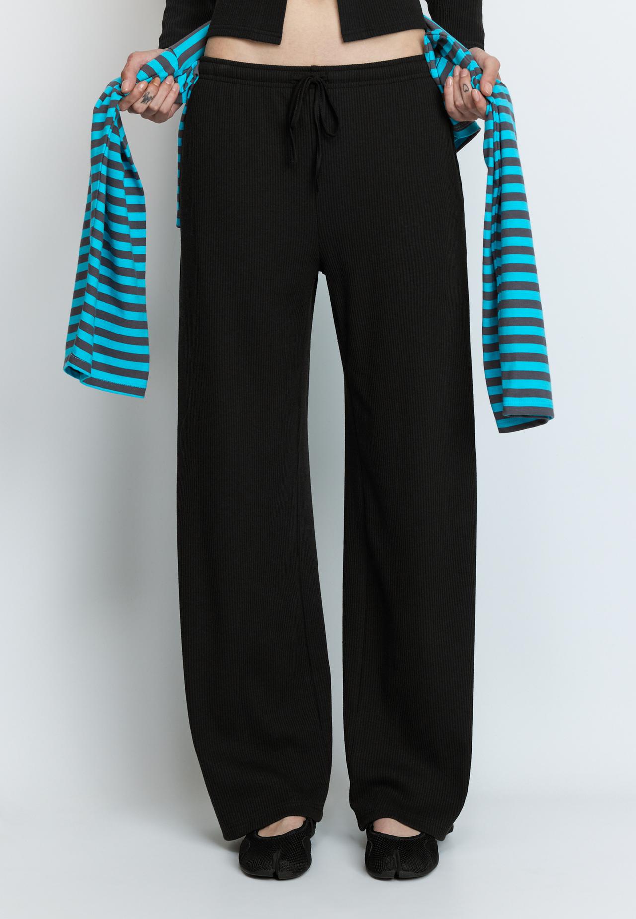 Soft-touch ribbed trousers — Black