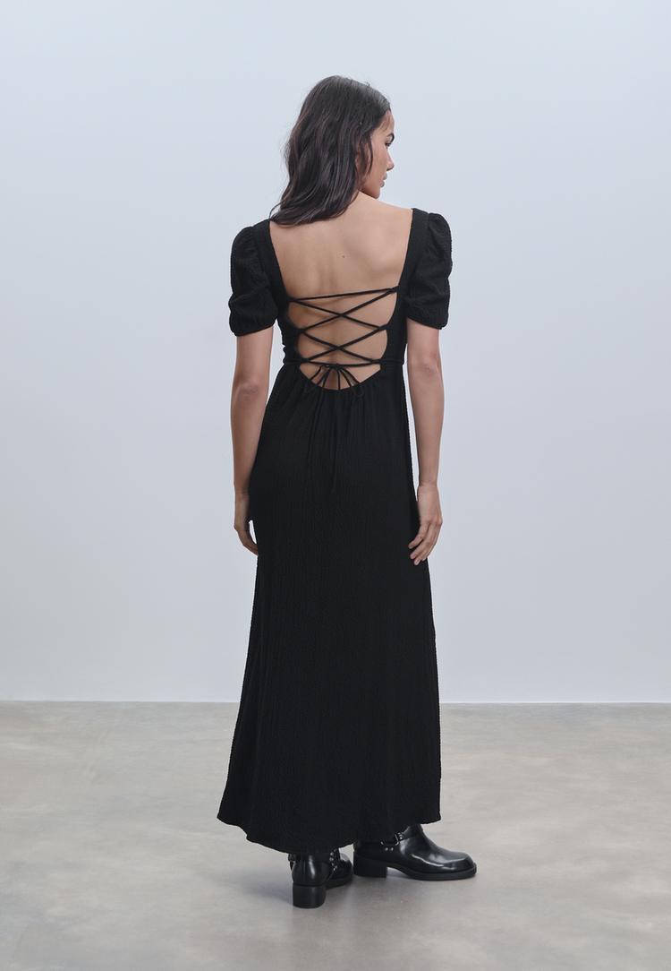vestito lungo fluido schiena incrociata
