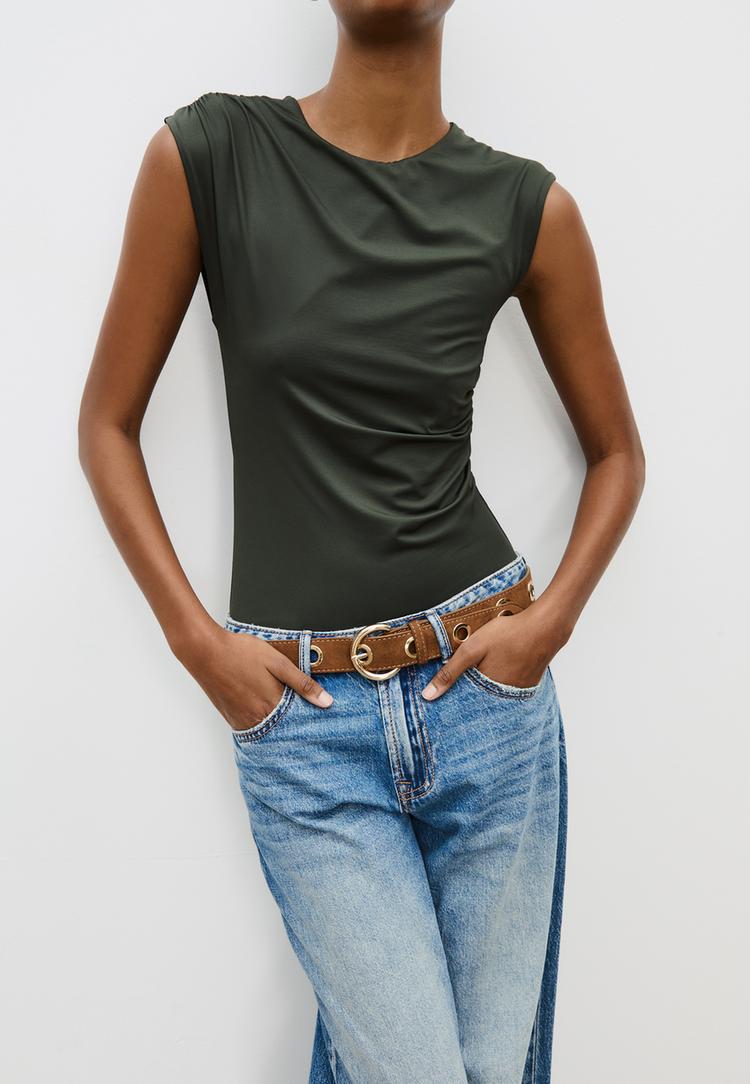 belt with metallic eyelets