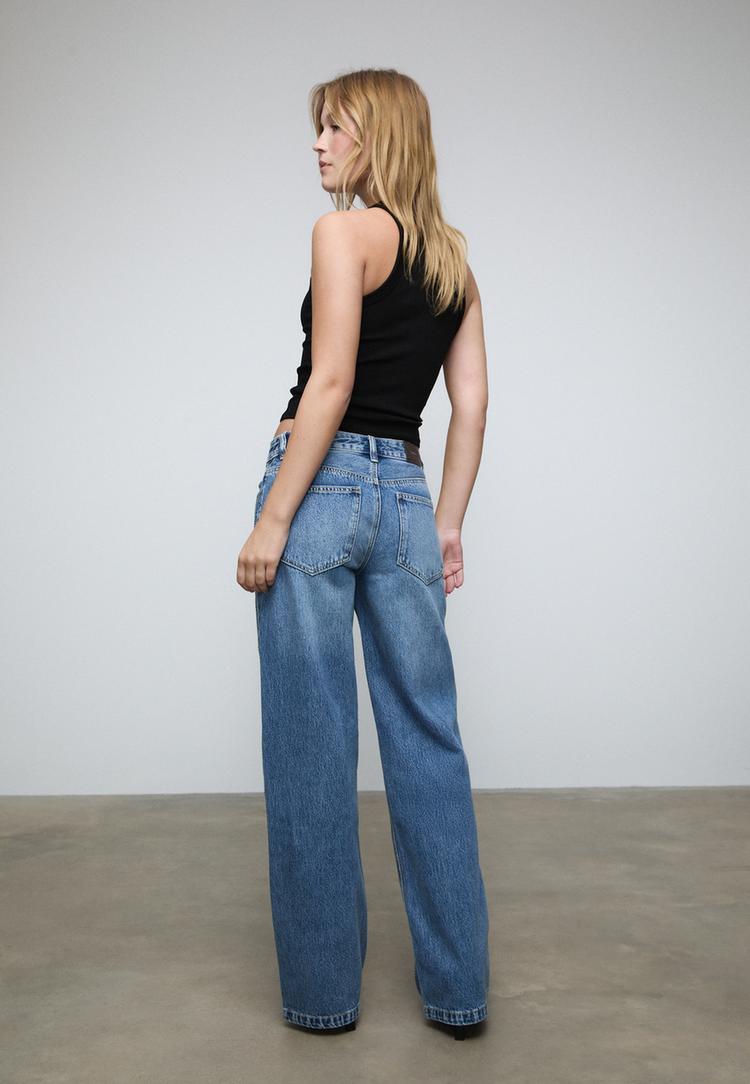 jeans con brillantini a forma di diamante