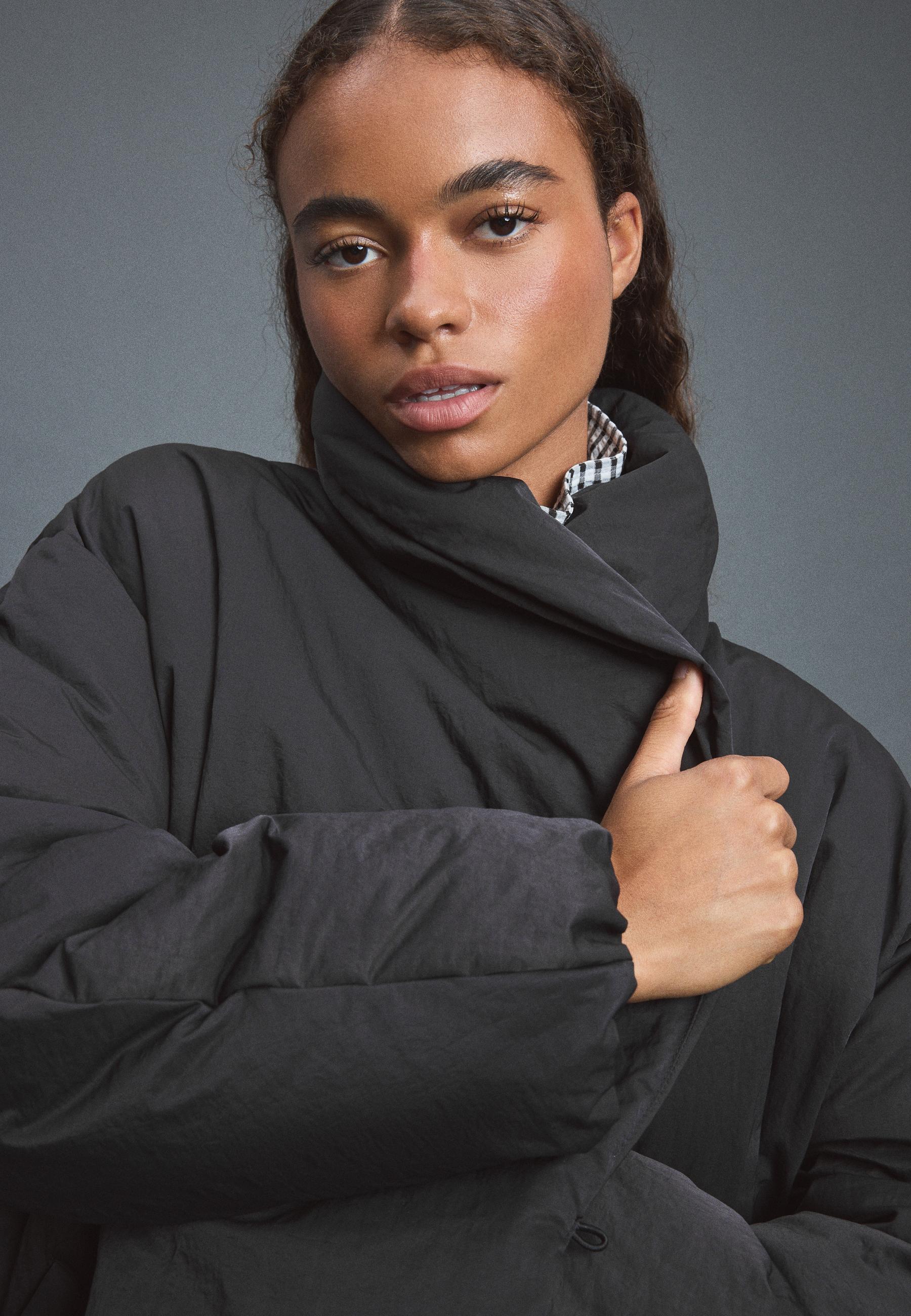 Padded jacket with shawl neck and belt — Black