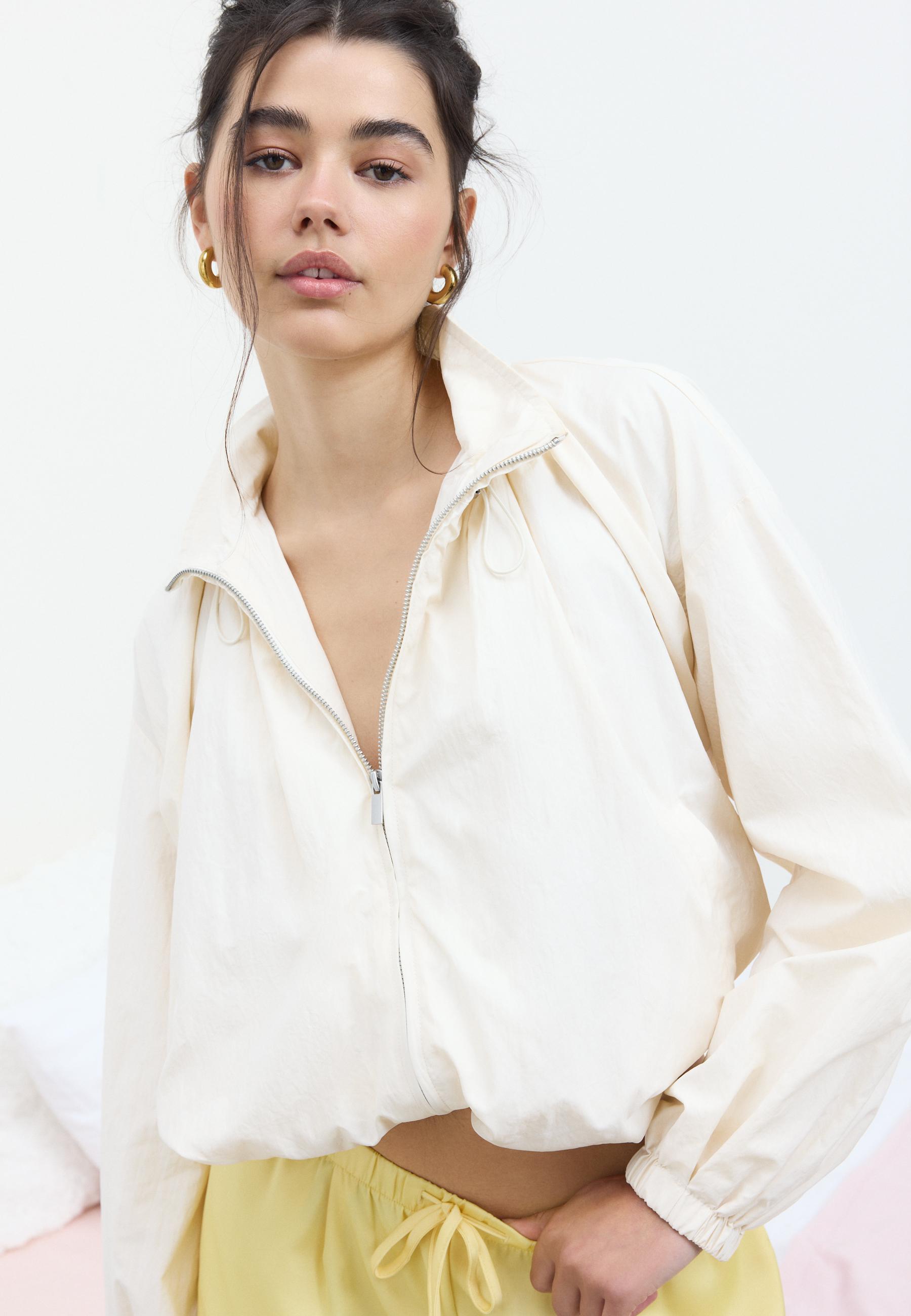Technical high neck jacket — Ecru