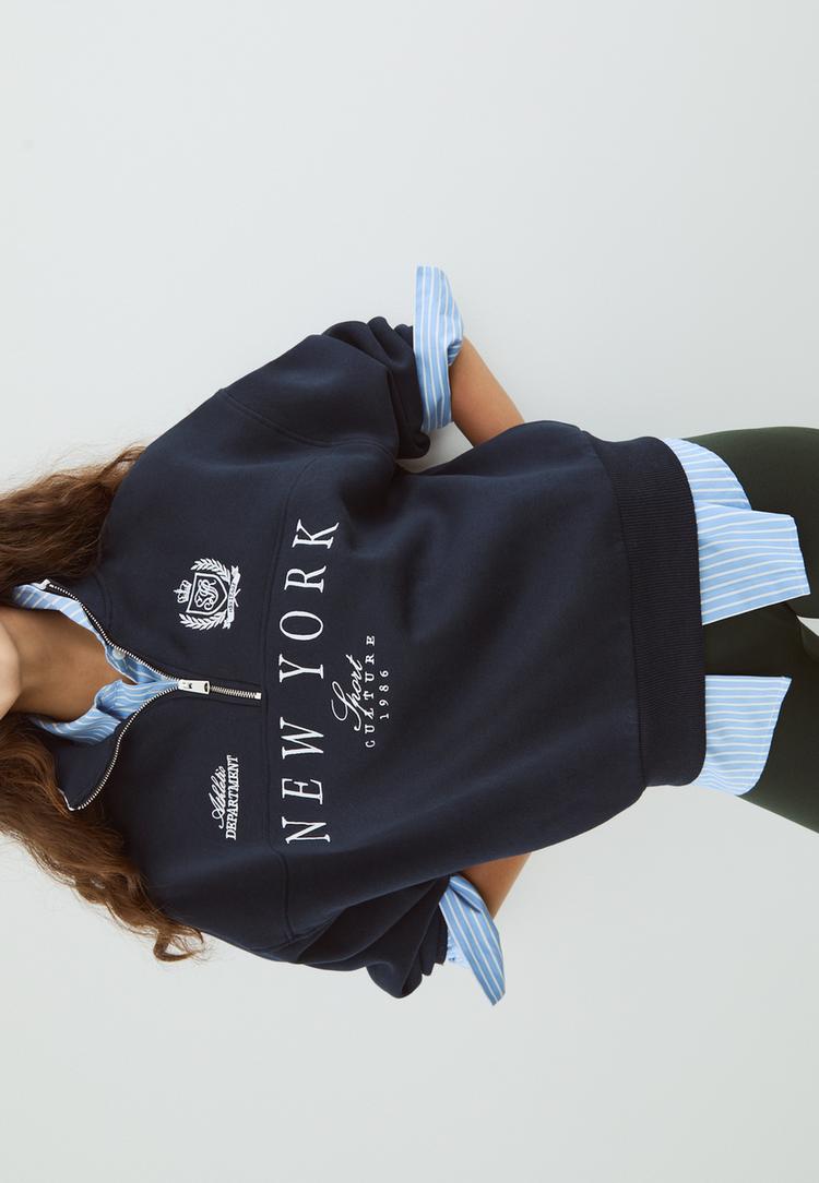 sweatshirt-mit-reiverschluss-und-stickereien