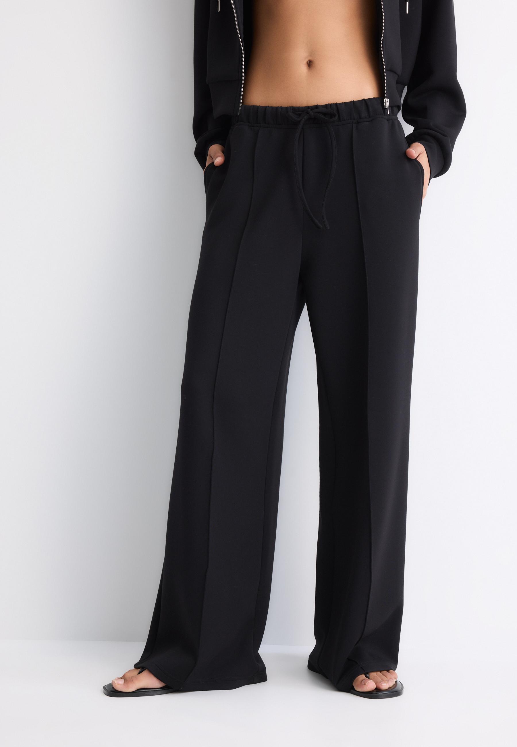 Pantaloni jogger pentru îmbrăcăminte | Stradivarius Romania