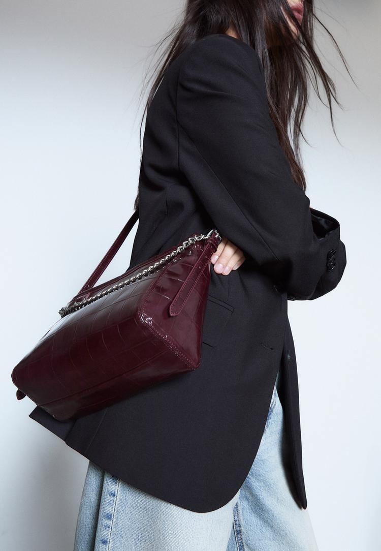 bolso bandolera efecto coco cadena