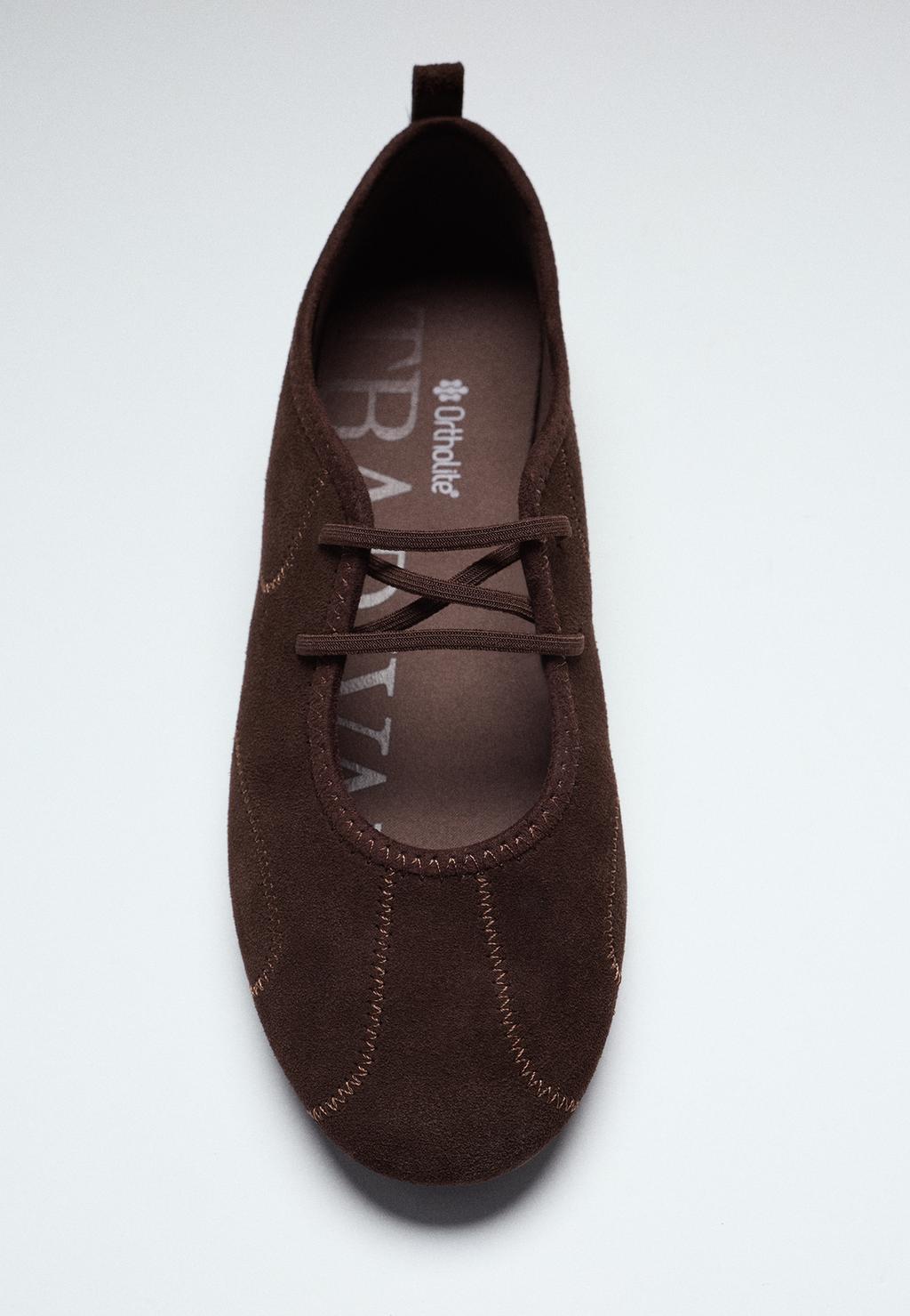 Leather elastic strap trainers
