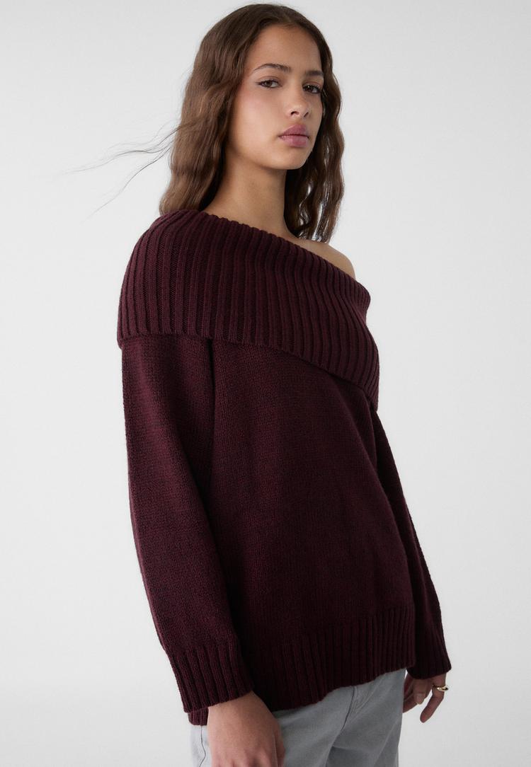 maglia in maglia con spalle scoperte