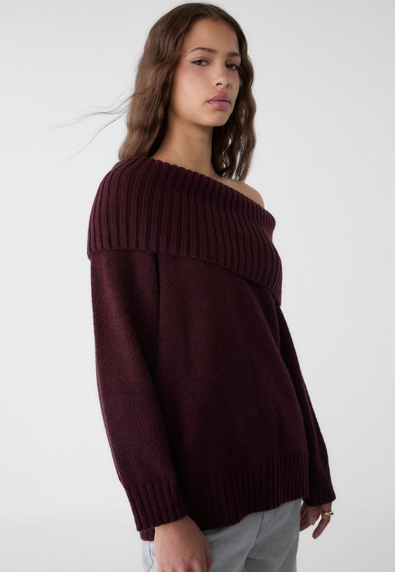 maglia in maglia con spalle scoperte