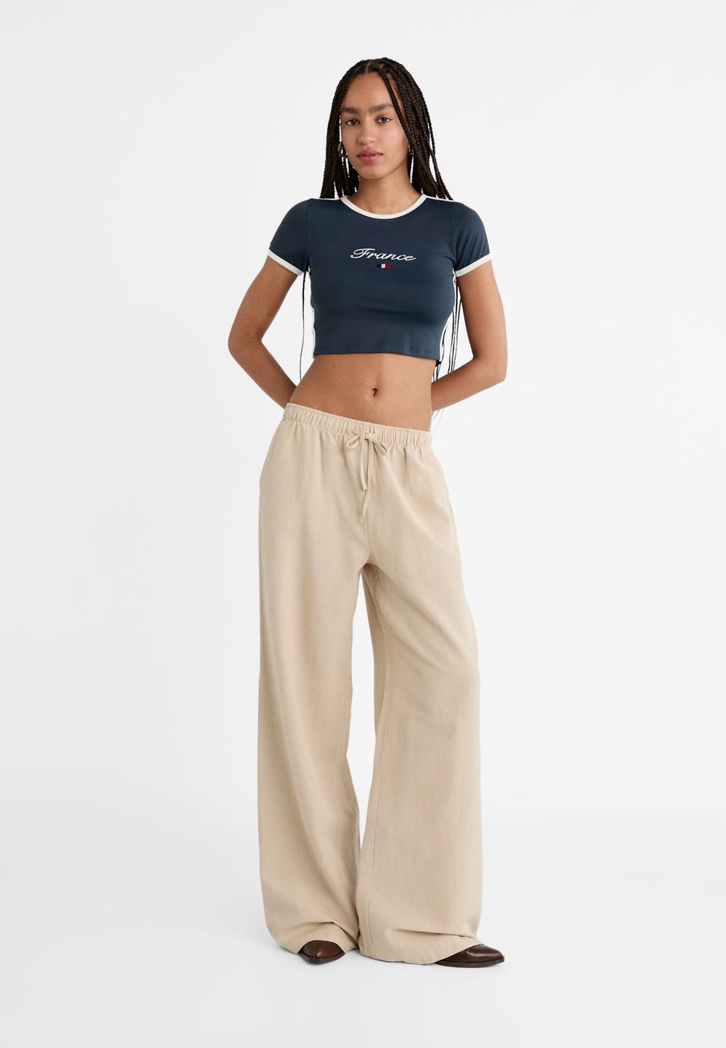 Loose-fitting linen blend trousers