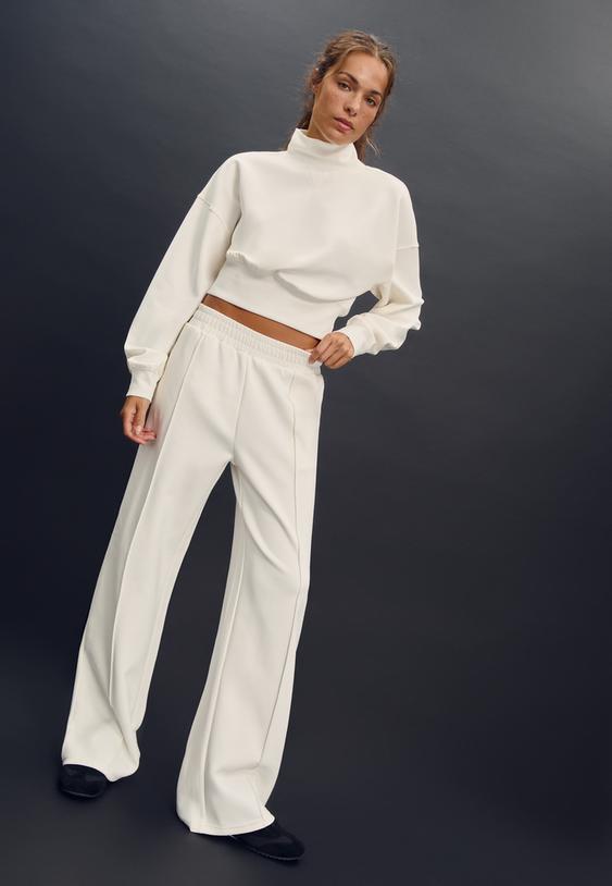 faded jogging trousers