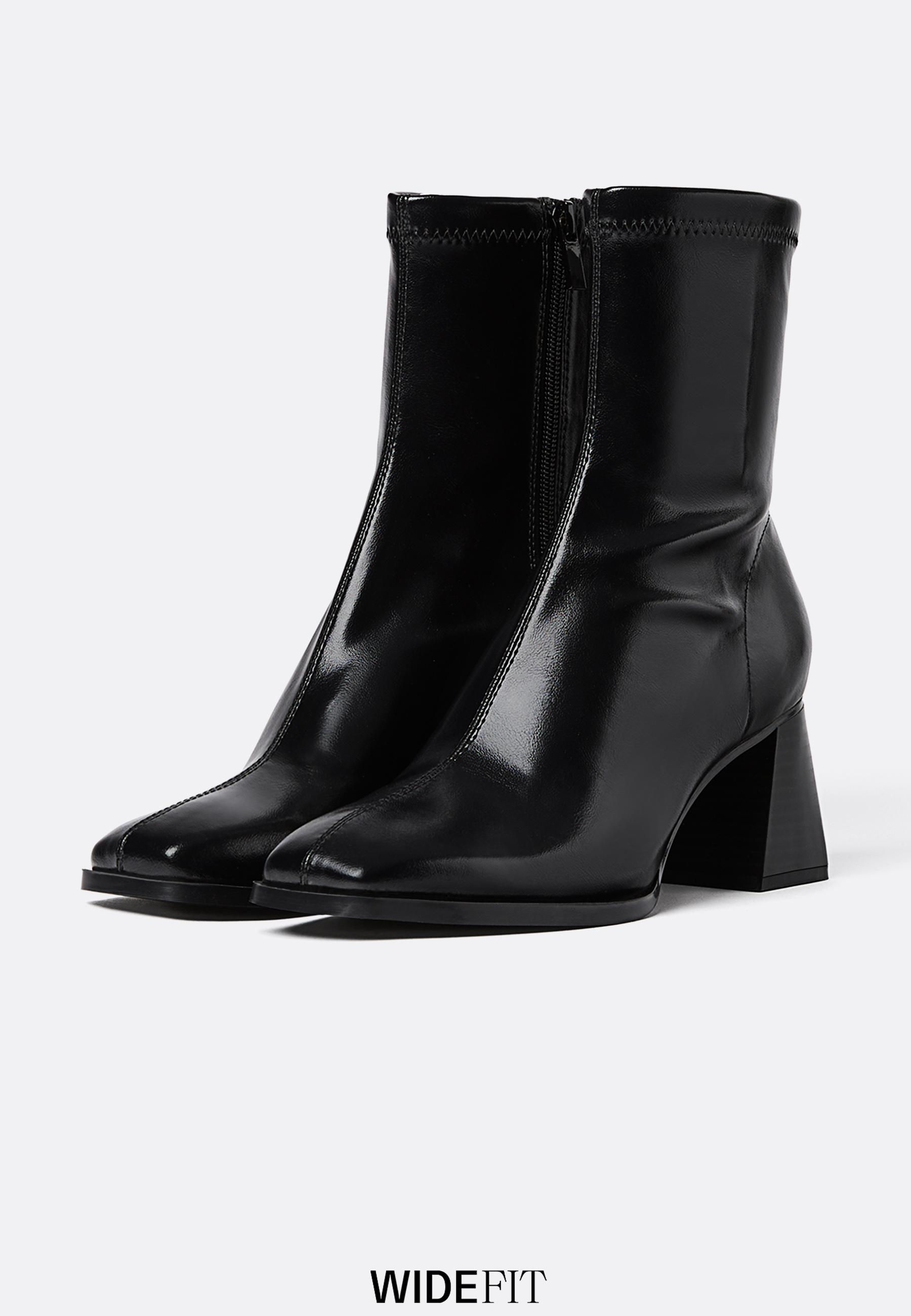 Mid-heel boots with stretch legs — BLACK