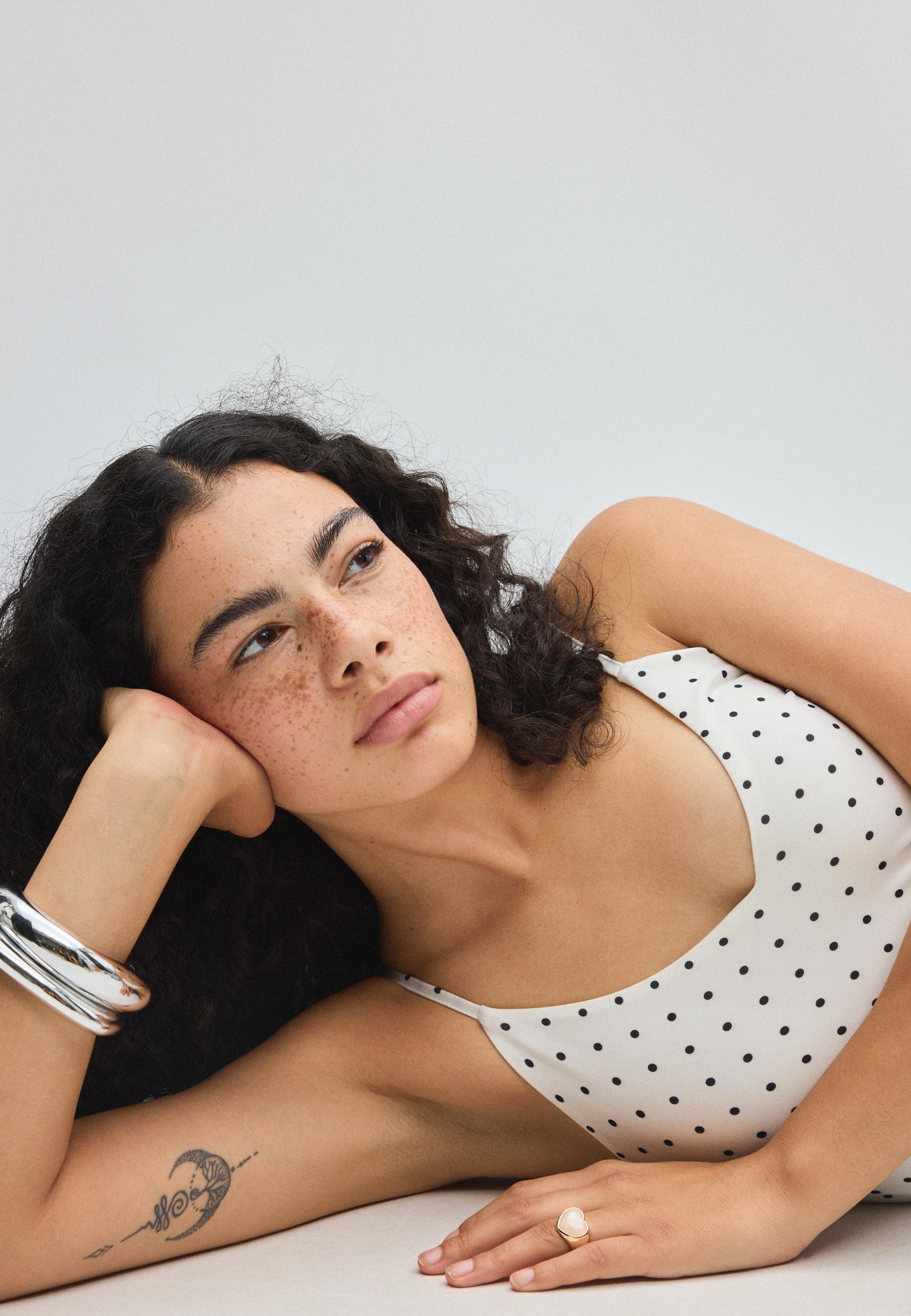 Polka dot V-neck strappy bodysuit — Ecru