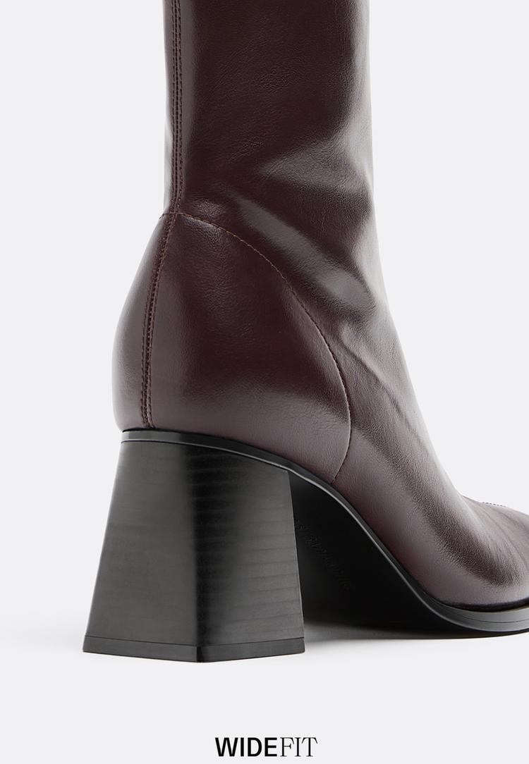 wide fit mid heel boots with stretch legs