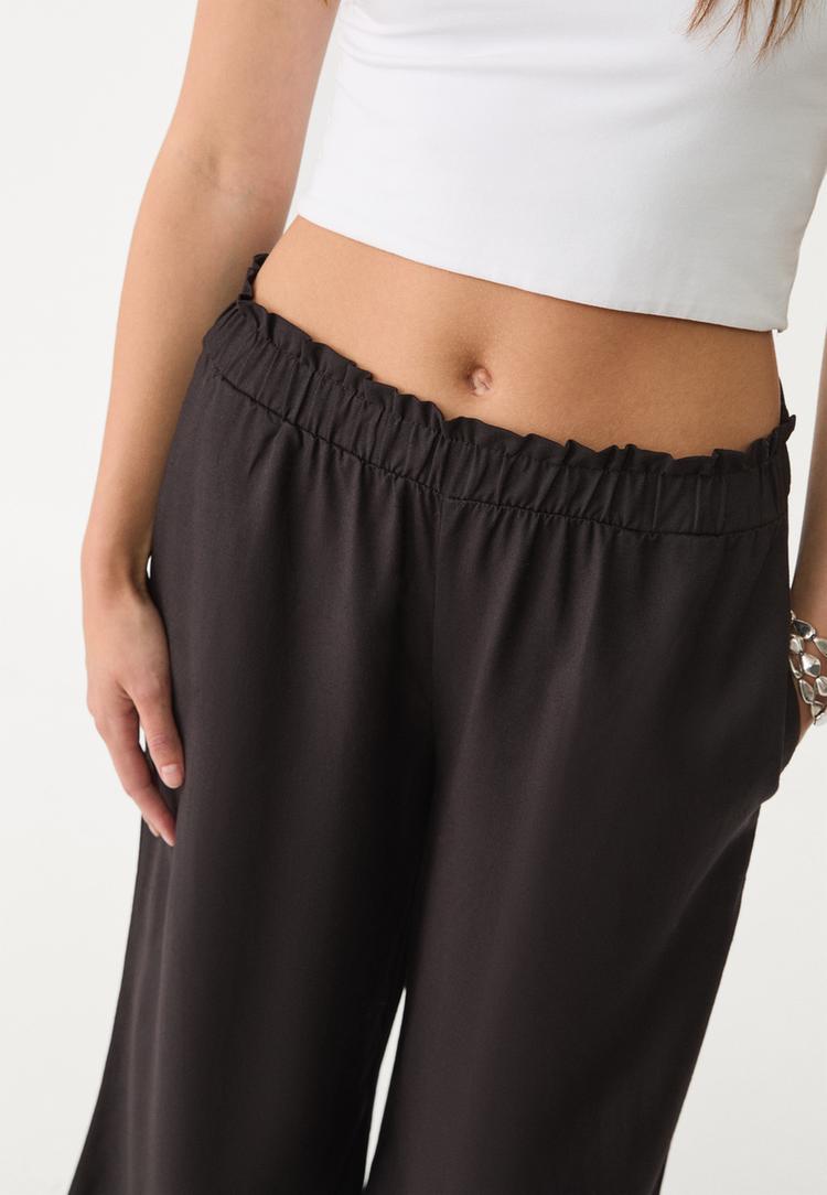 pantalon palazzo fluido con lino