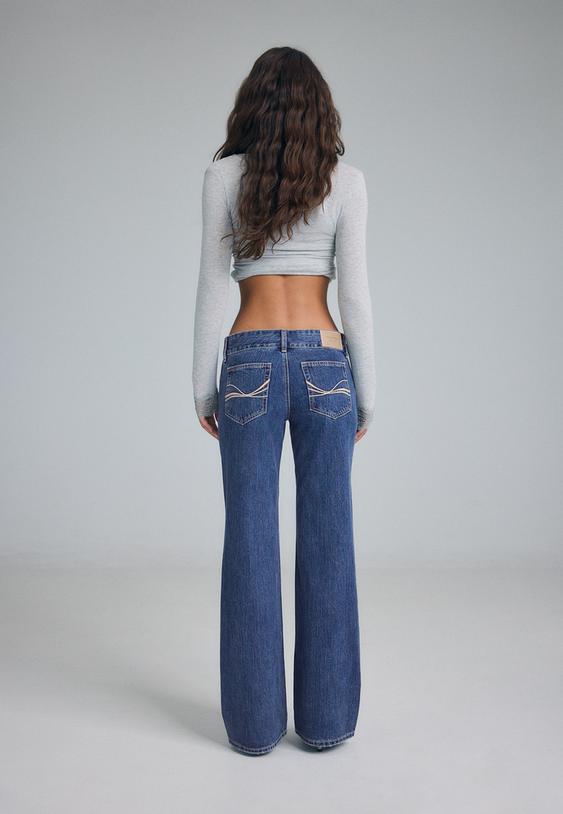 lowwaist wide leg jeans met hamerstijl tailleband