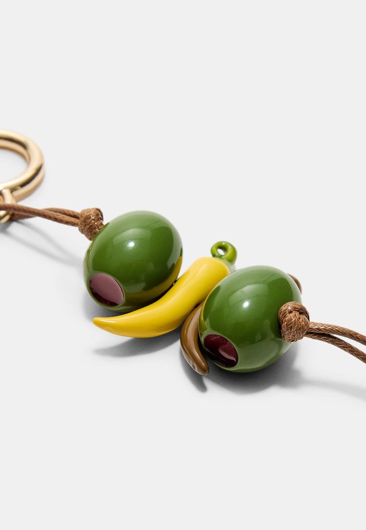 Stradivarius Μπρελόκ Με Γούρι Γκίλντα Λαδί Os φωτογραφία