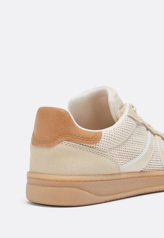 baskets perforees details cuir