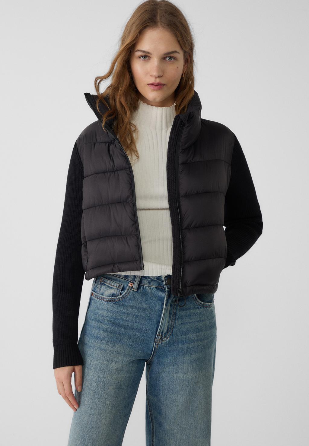 Puffer jacket with chunky knit sleeves