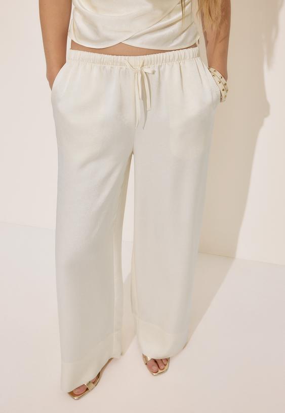 calcas de vestir com pincas