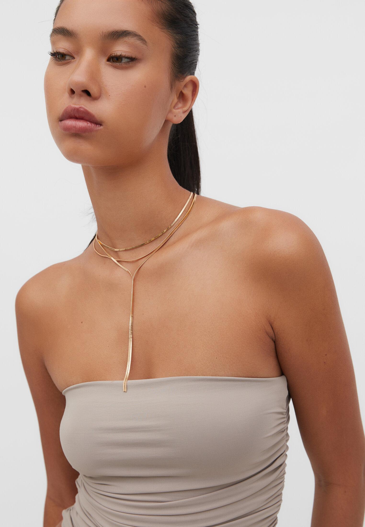 Long multi-chain necklace — Gold