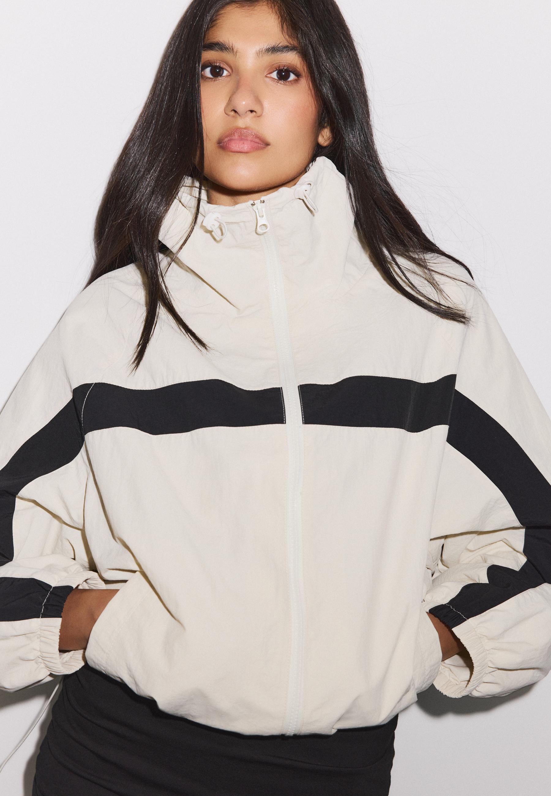 Technical windbreaker jacket — Black