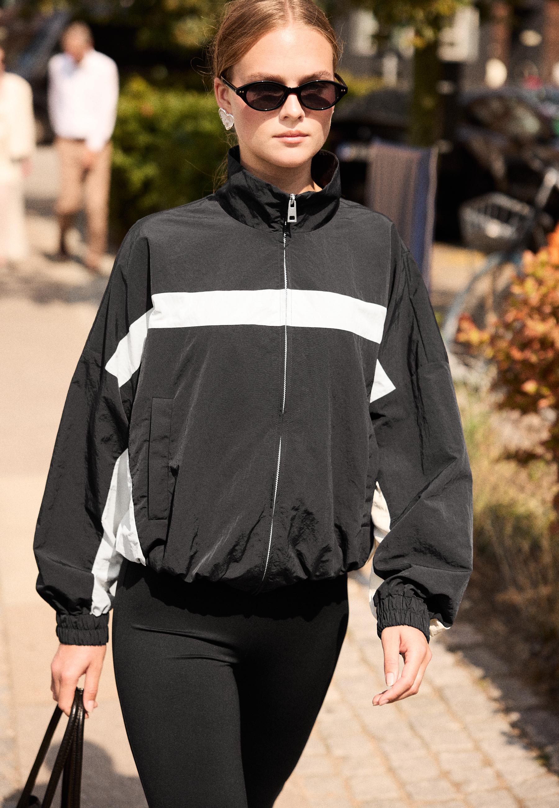 Technical windbreaker jacket — Black