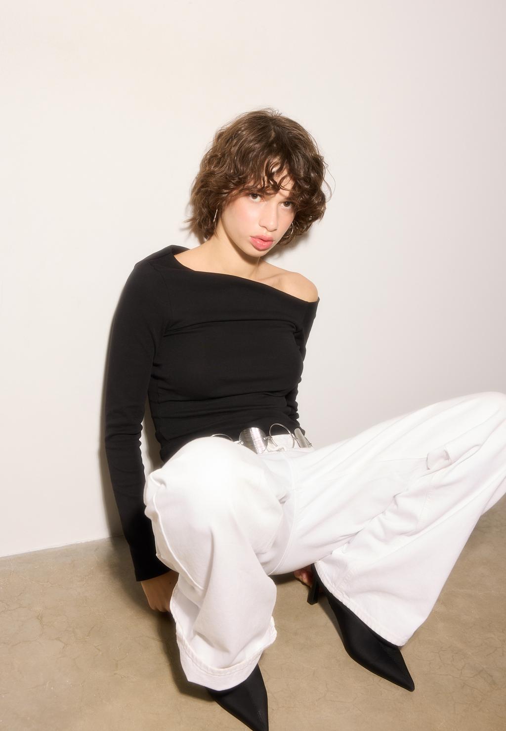 Top with asymmetric neckline