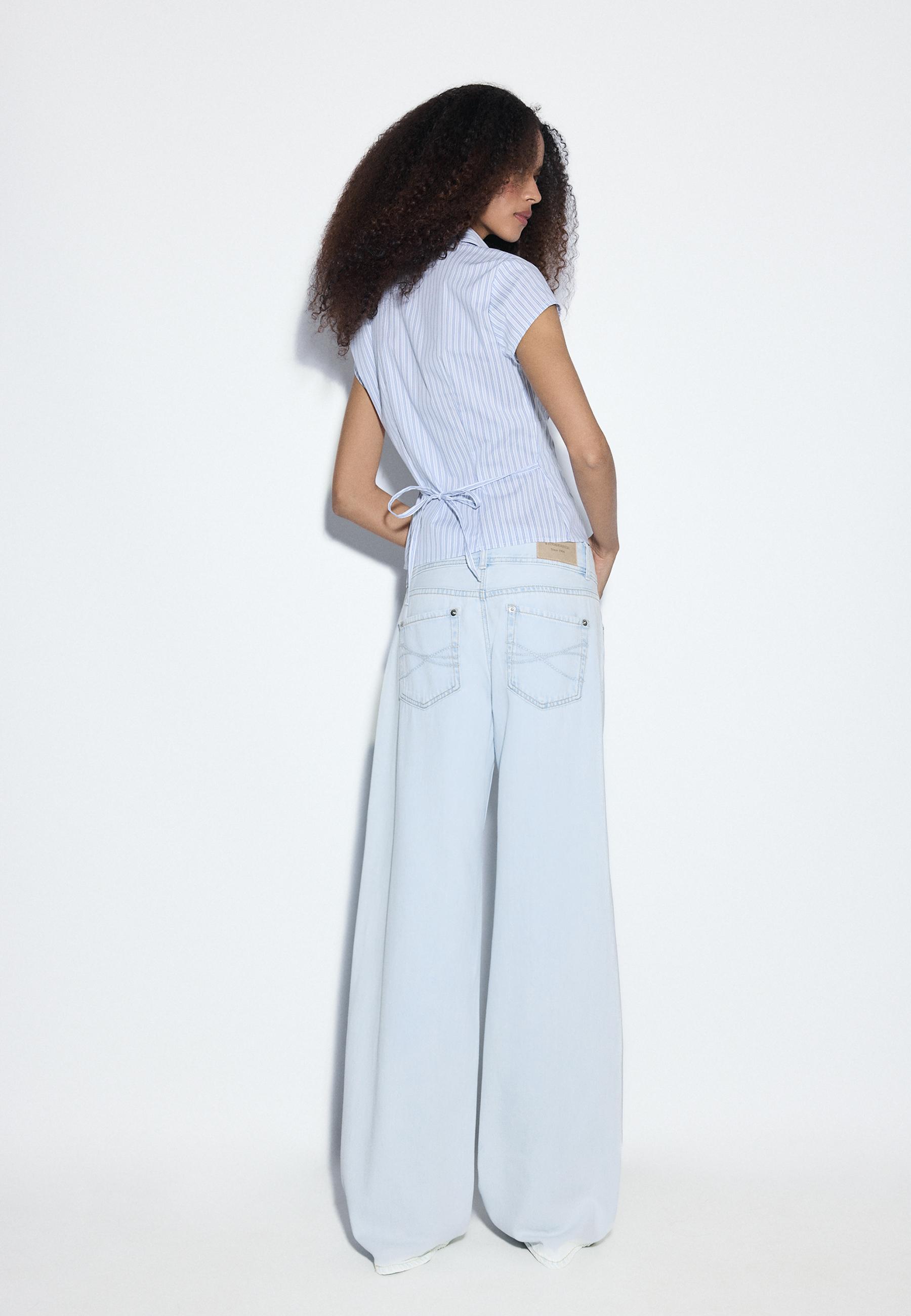 Low-rise double-button jeans — LIGHT BLEACH