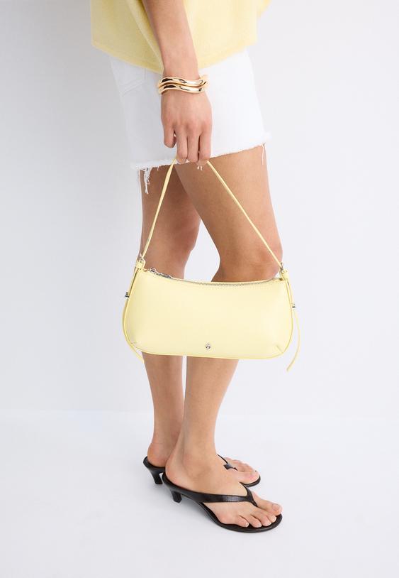 bolso hombro alargado eyelets