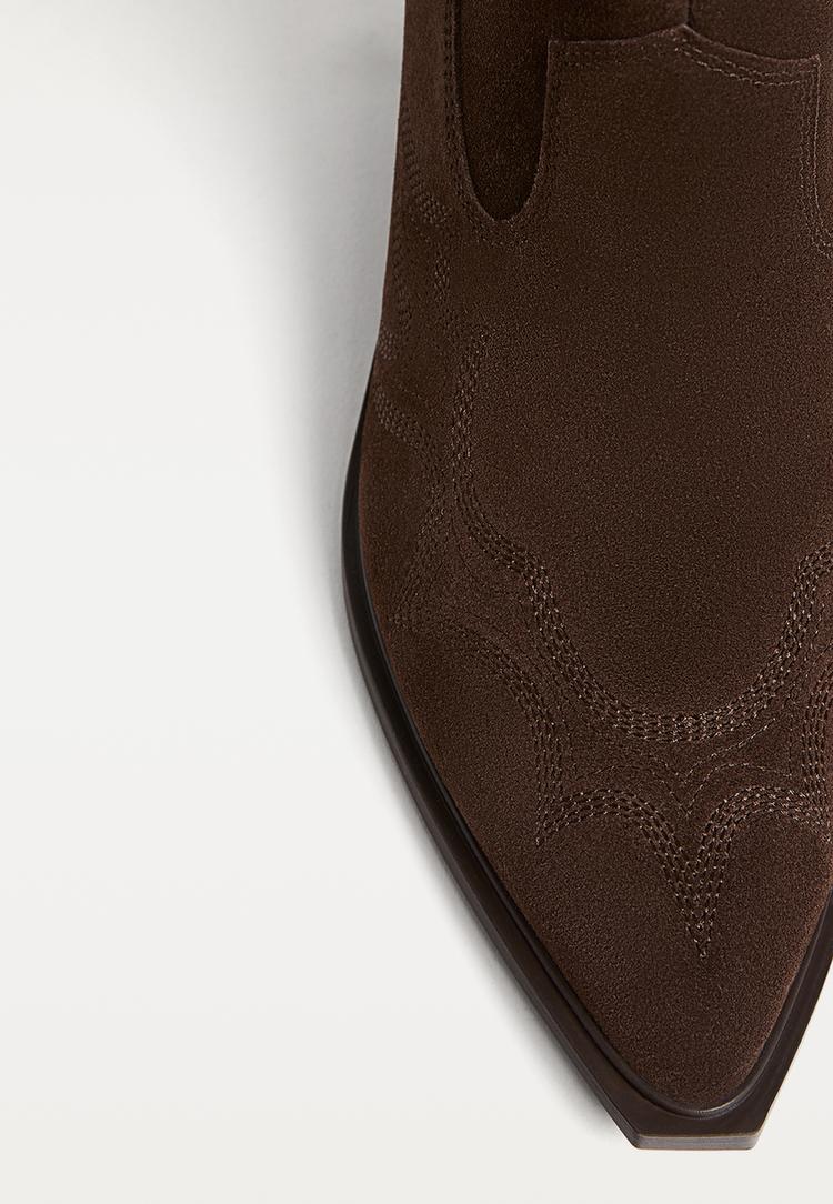 bottines cowboy a talon en croute de cuir