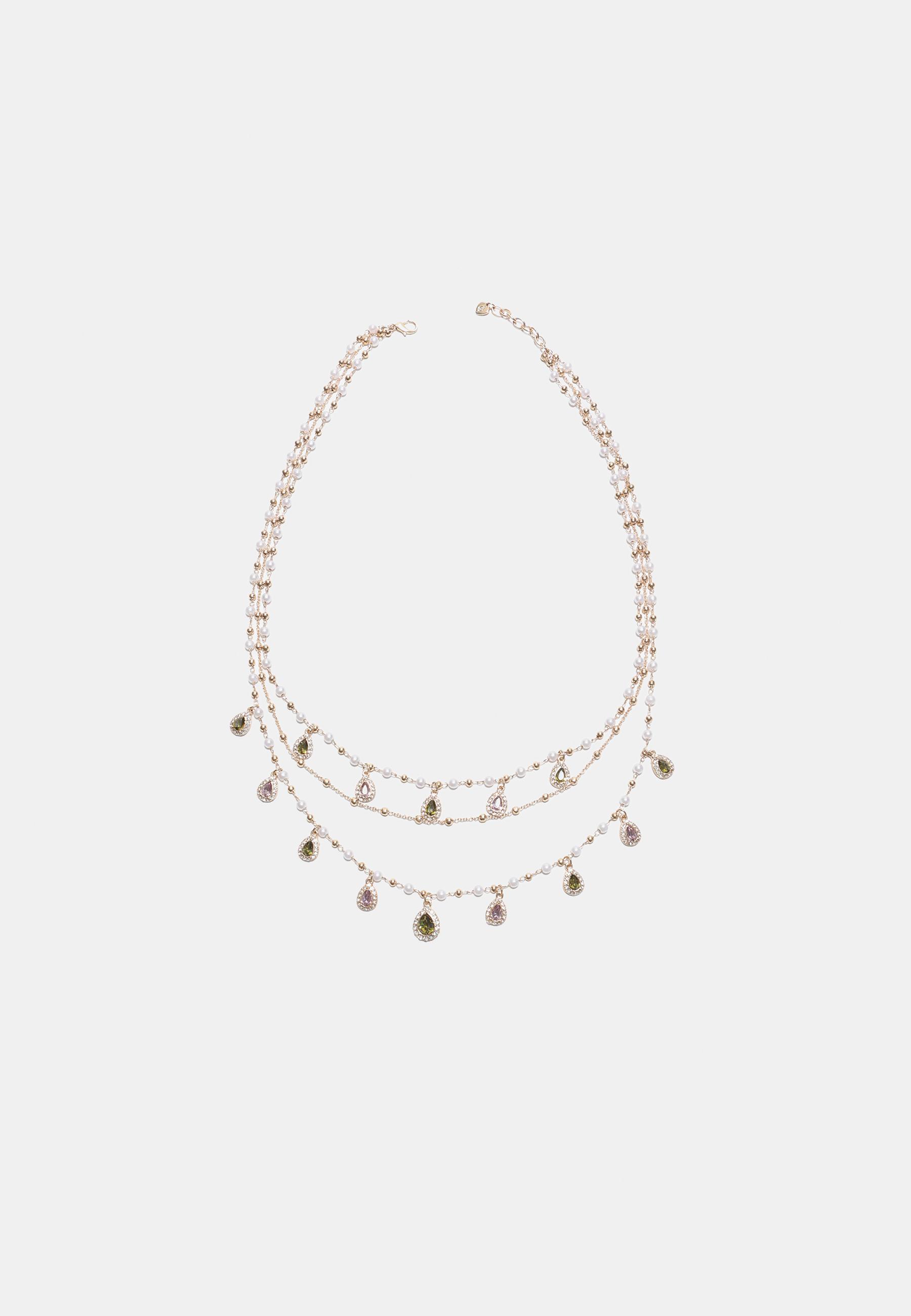 Long multi-charm necklace — Gold