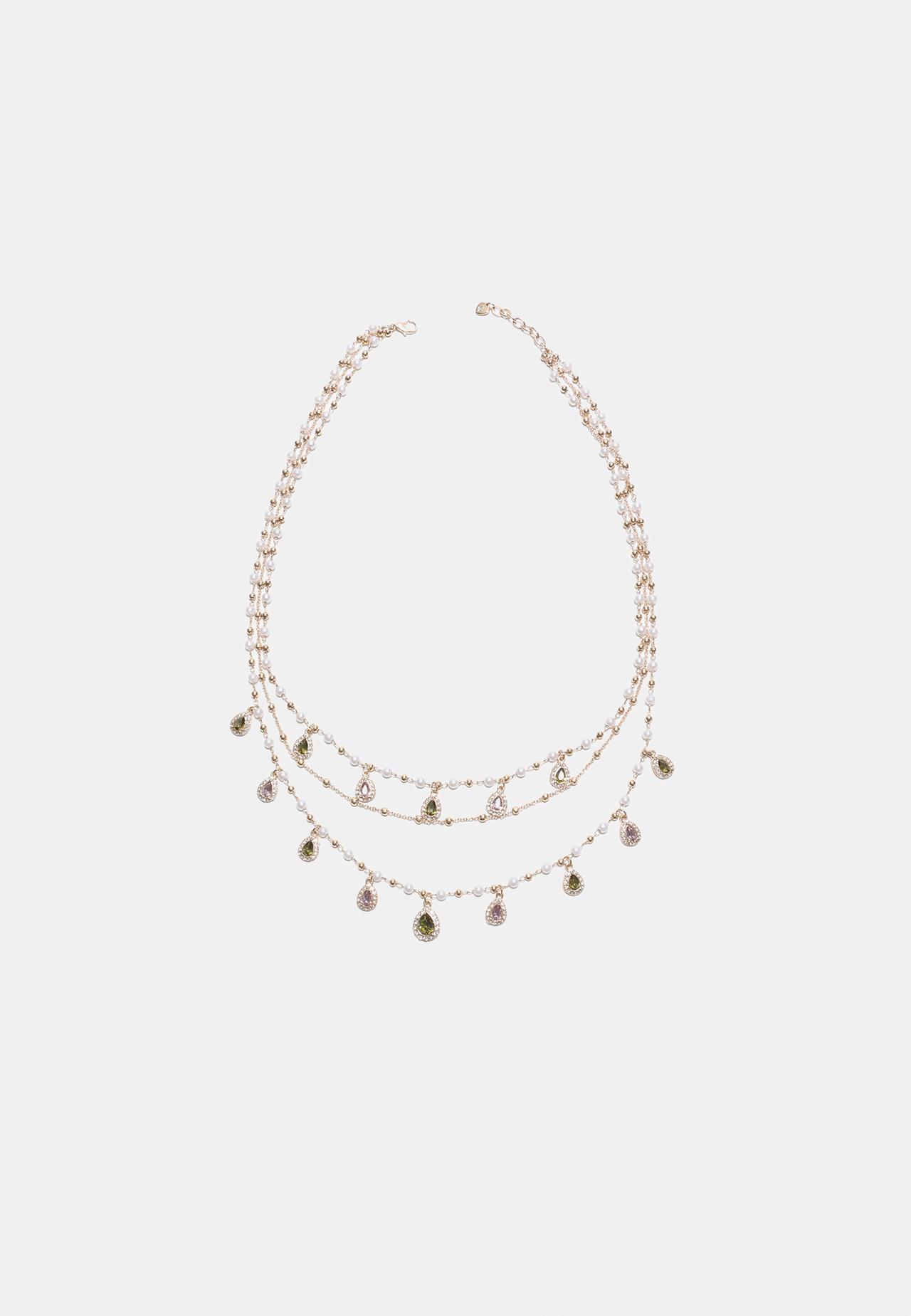 Long multi-charm necklace — Gold
