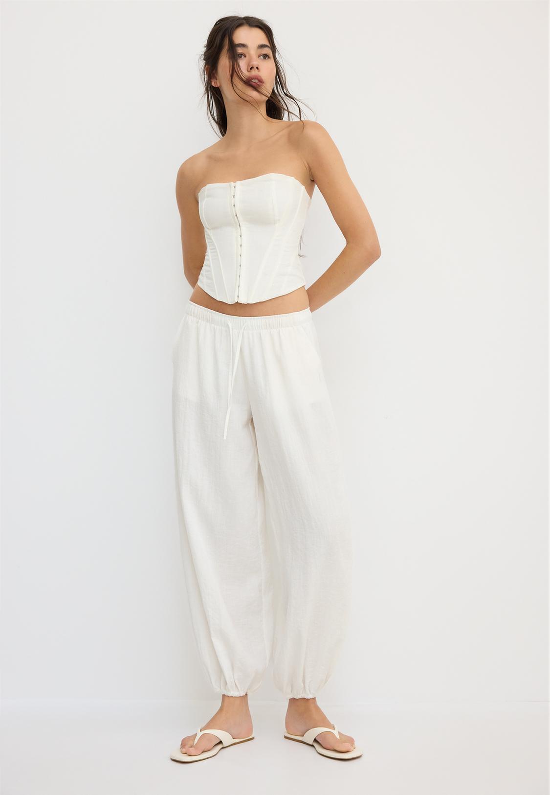 Flowy sarouel trousers - Women's fashion | Stradivarius United States Flowy sarouel trousers - Women's fashion | Stradivarius United States