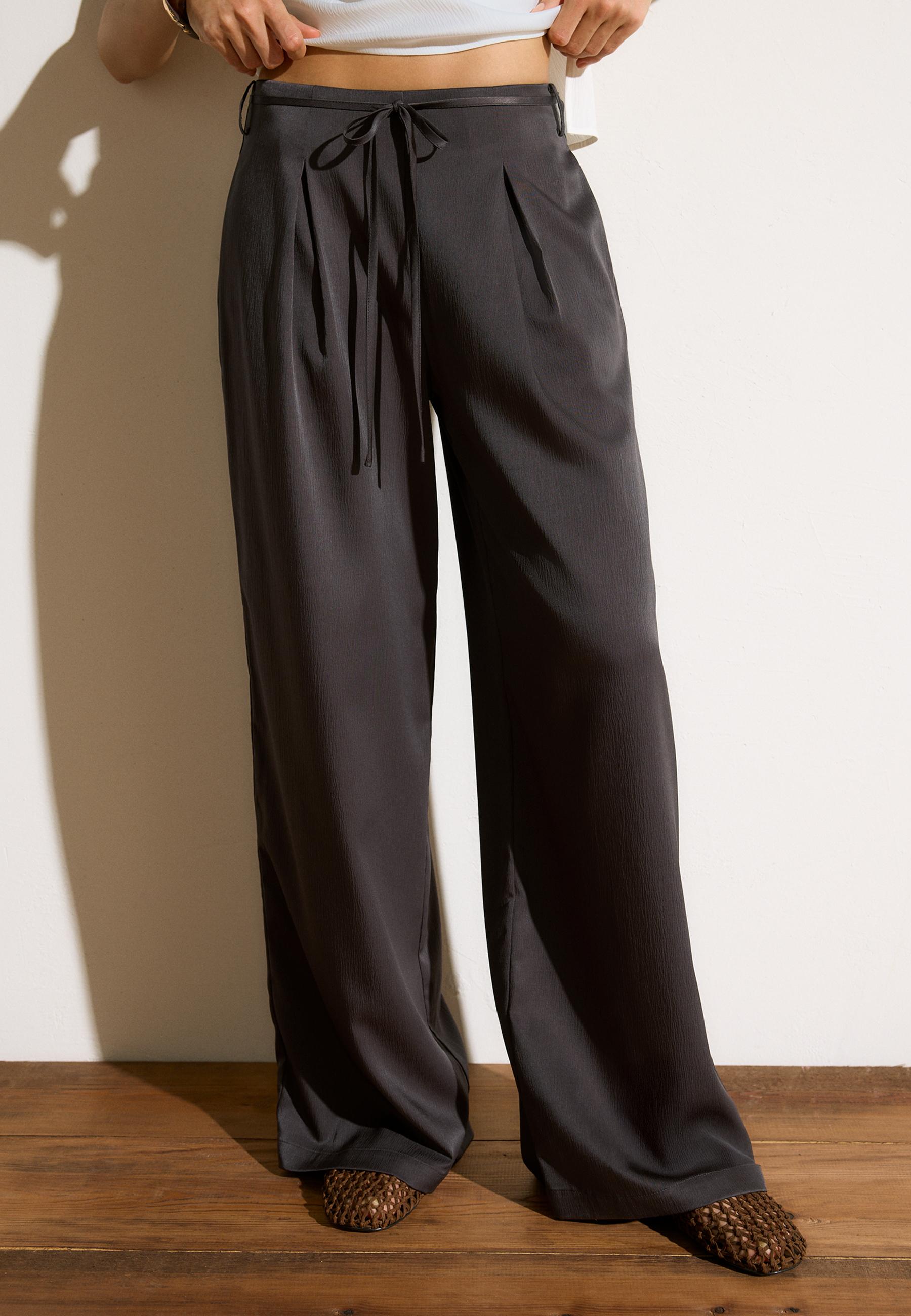 Flowing creased-effect trousers with tie — Brown