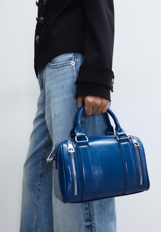 borsa a tracolla con dettaglio cerniere