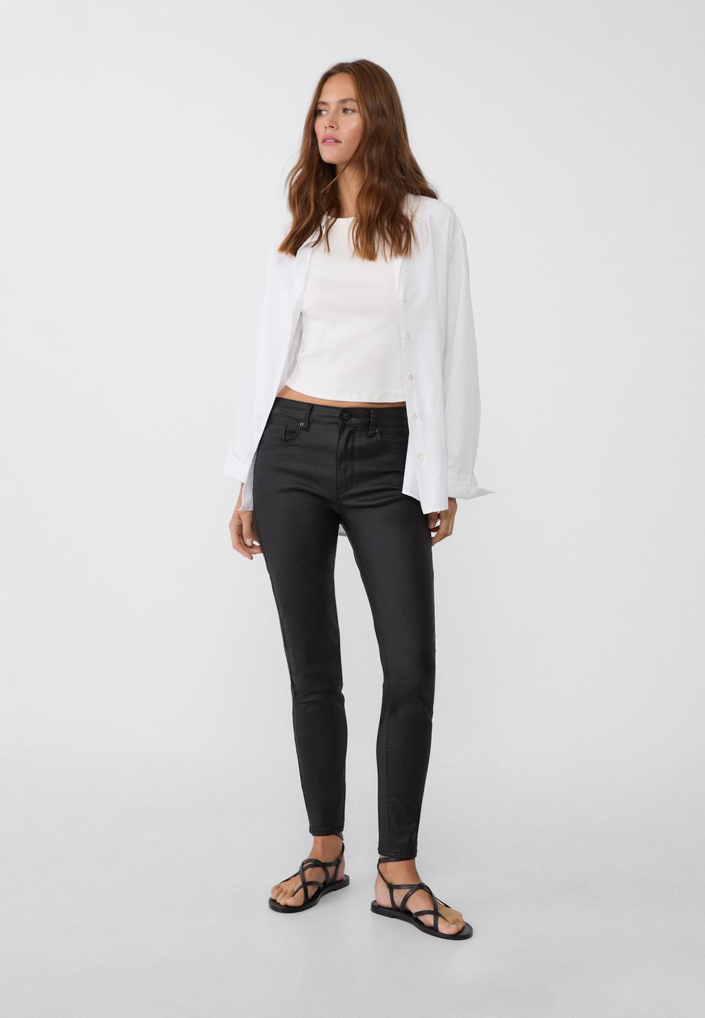 Coated low waist trousers