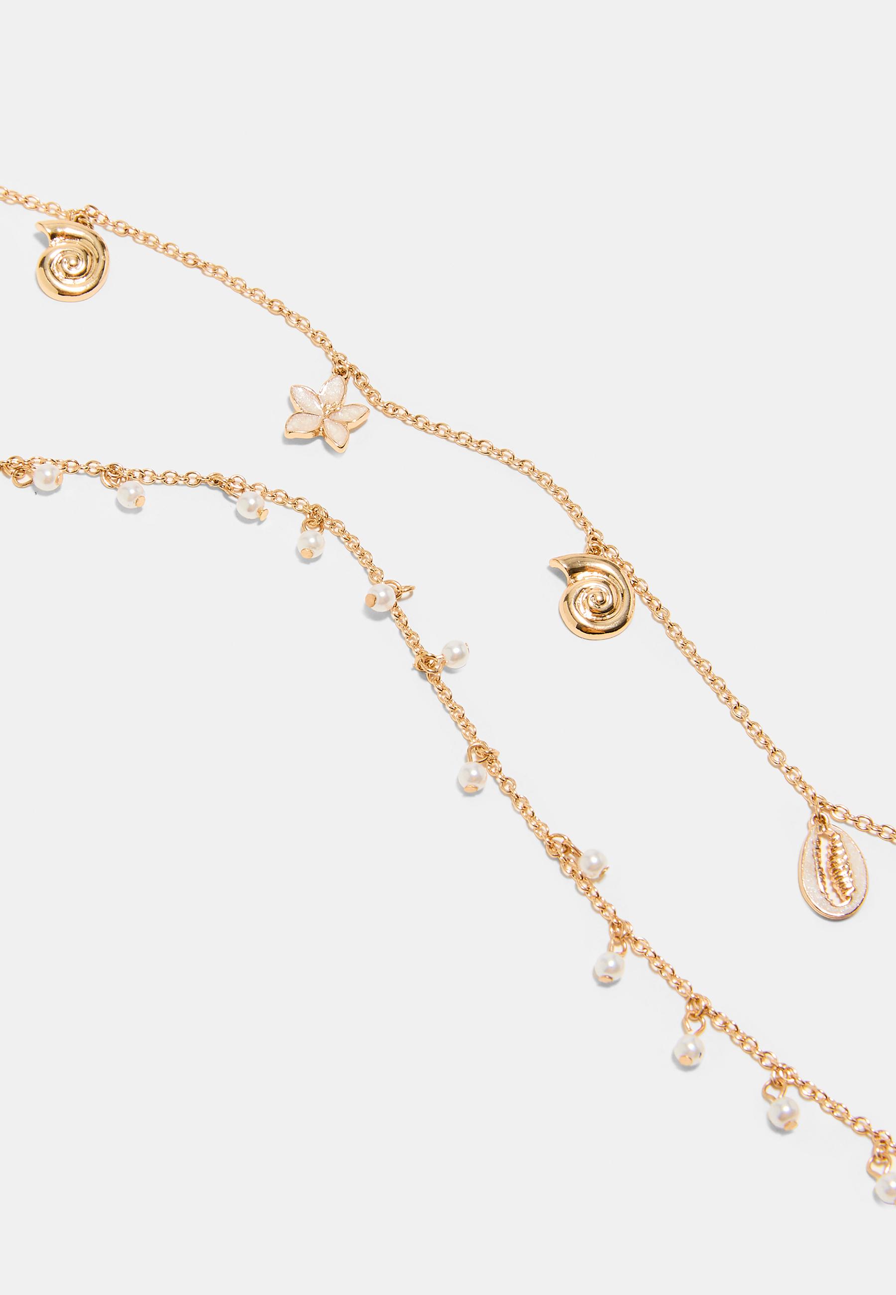 Multi-position necklace with mini sea charms — Gold