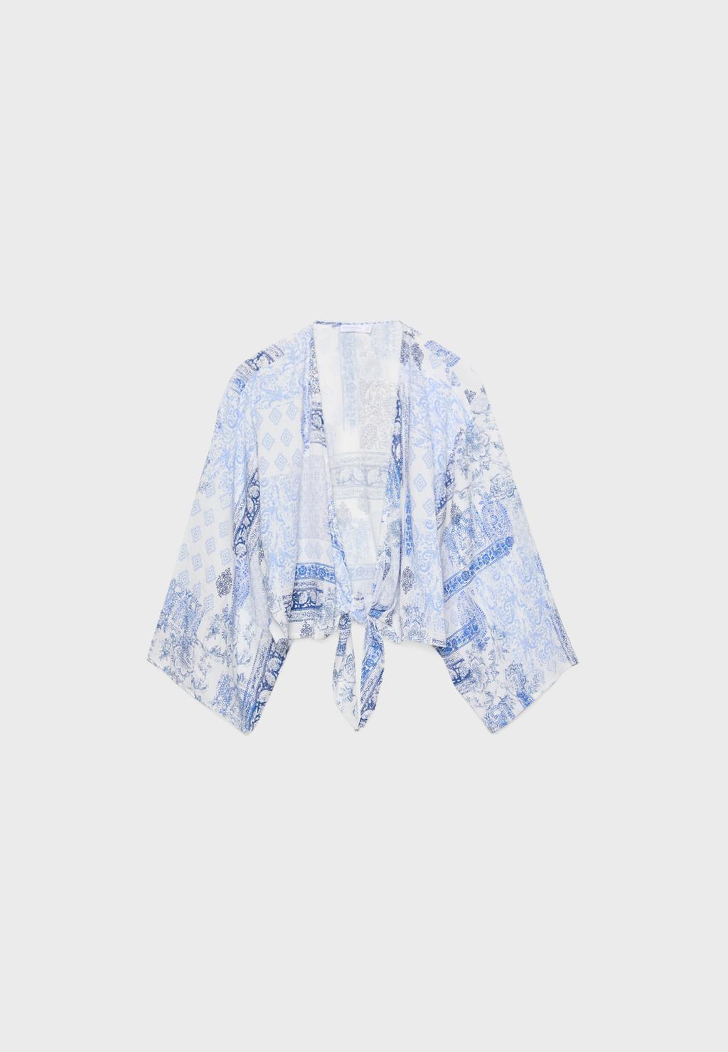 Soepele blouse met knoop